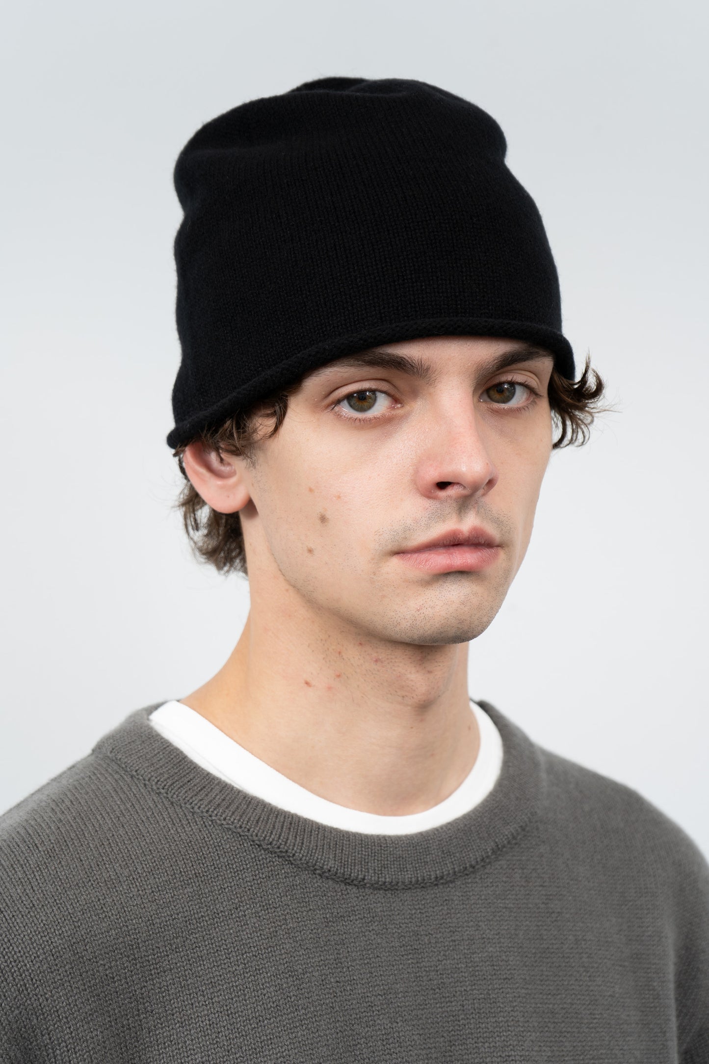 Close-up of model wearing LW036 Ambrosia Beanie in black