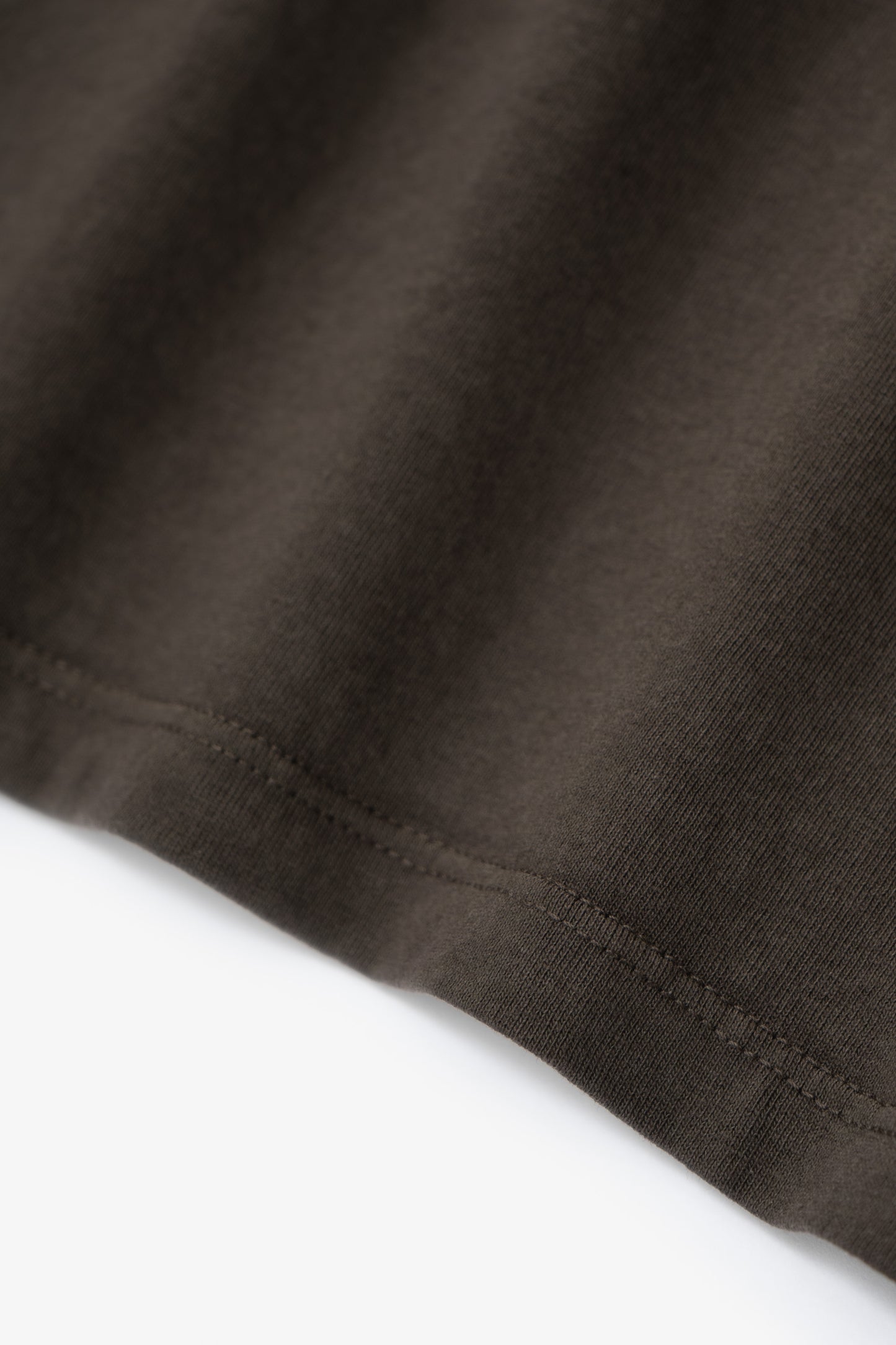 Close-up of LW101T “Our T-shirt in Black Pine.