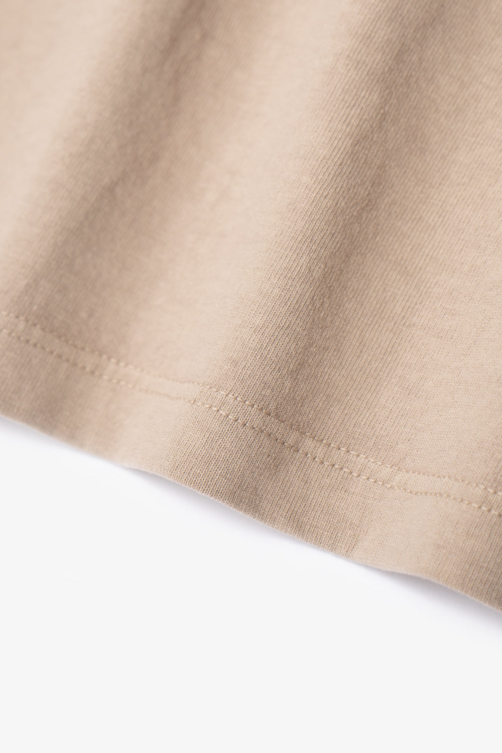 Close-up of fabric ripple of LW101 Our T-shirt in sand