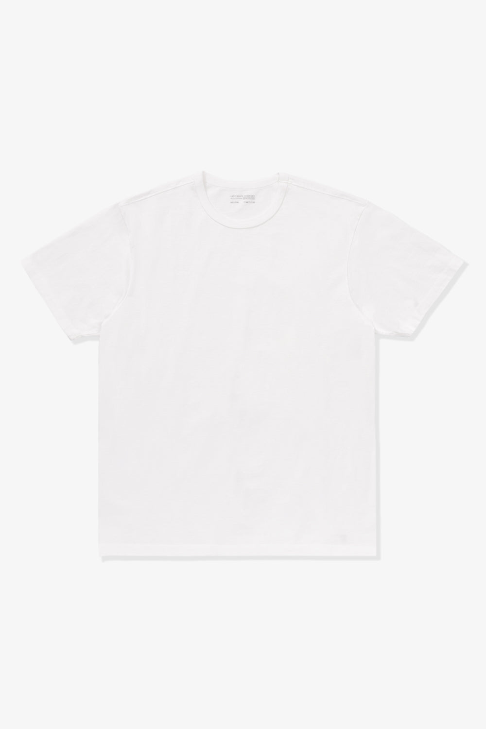 Model poses in LW101 Our T-shirt in white