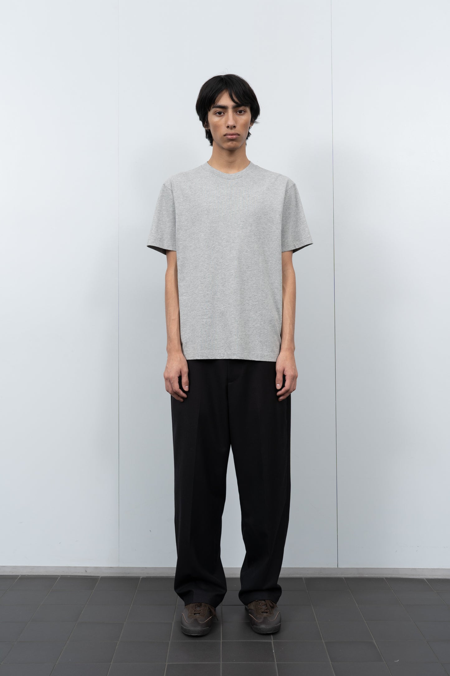 LW102 Municipal T-shirt in Heather Grey on a model