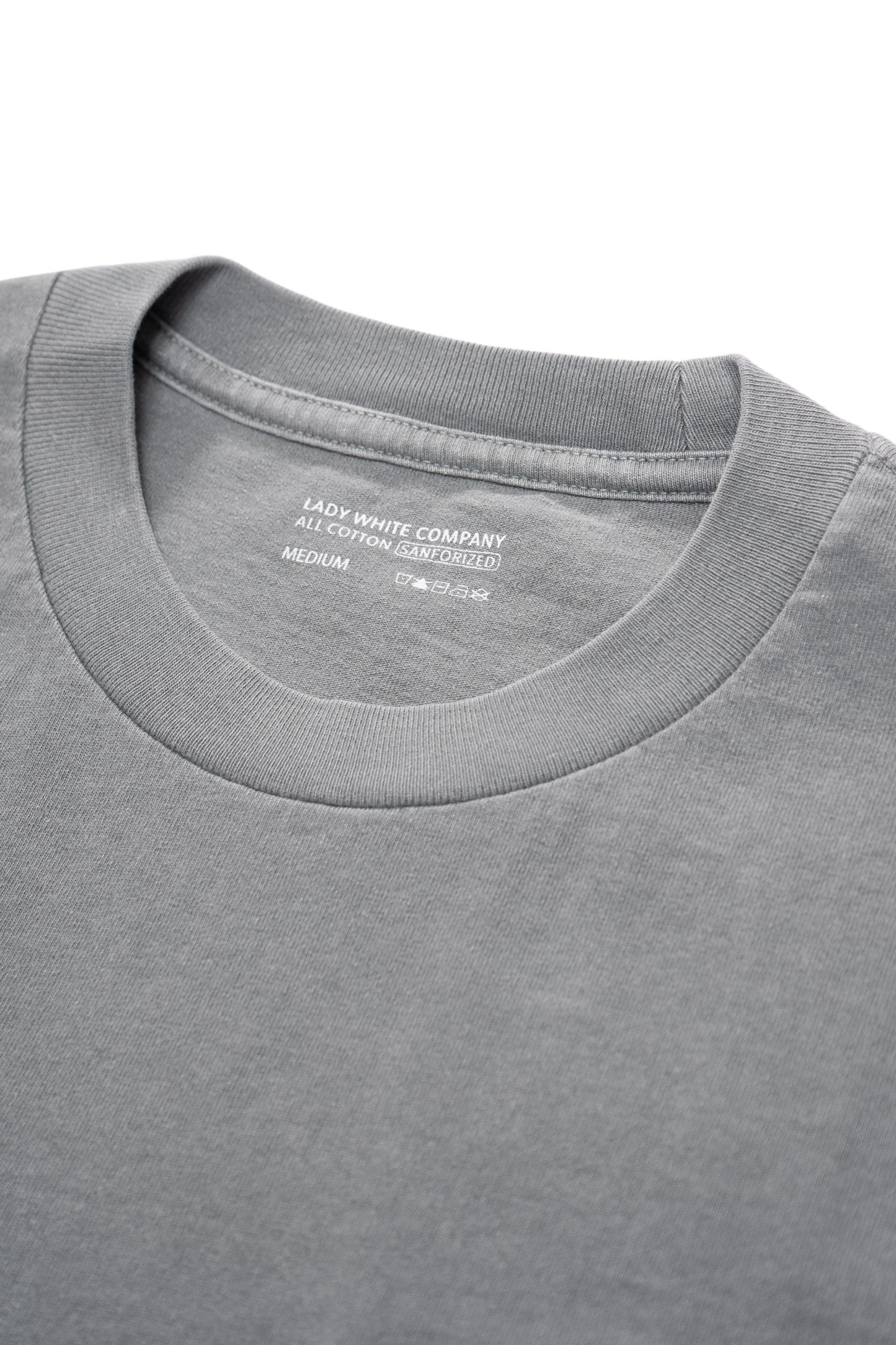 Close-up of collar of LW103 Municipal Packet T-shirt in pigment kelp