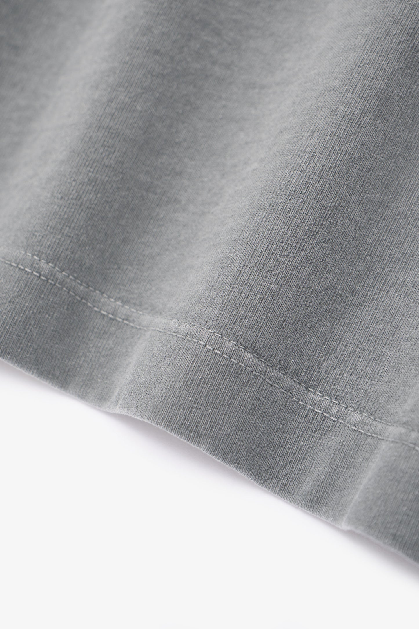 Close-up of fabric ripple of LW103 Municipal Pocket T-shirt in pigment kelp