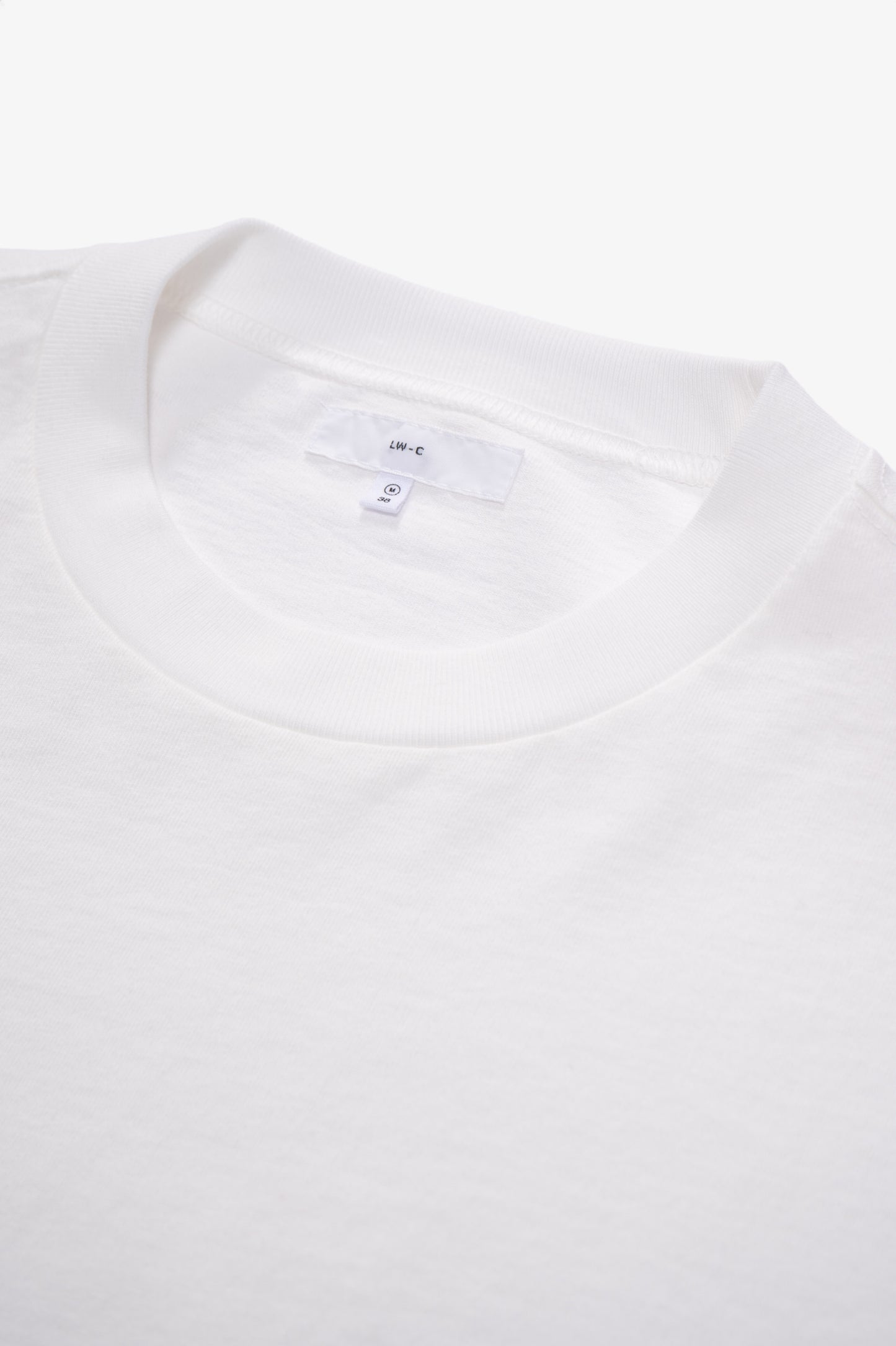 Collar detail of LW108 Tripanel L/S T-shirt in White