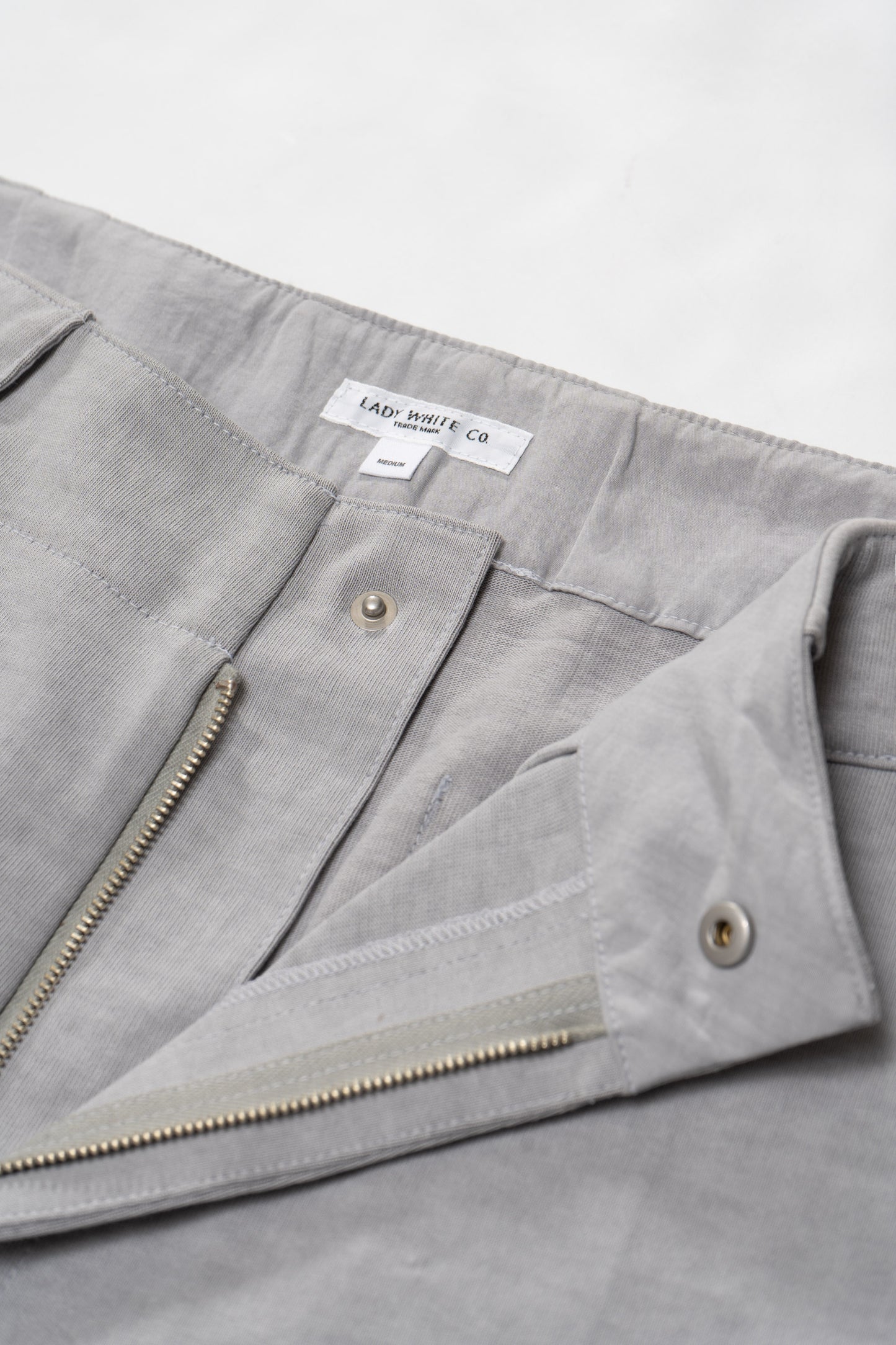 Zipper detail of LW1100 Jersey Trouser in Pigment Chalk