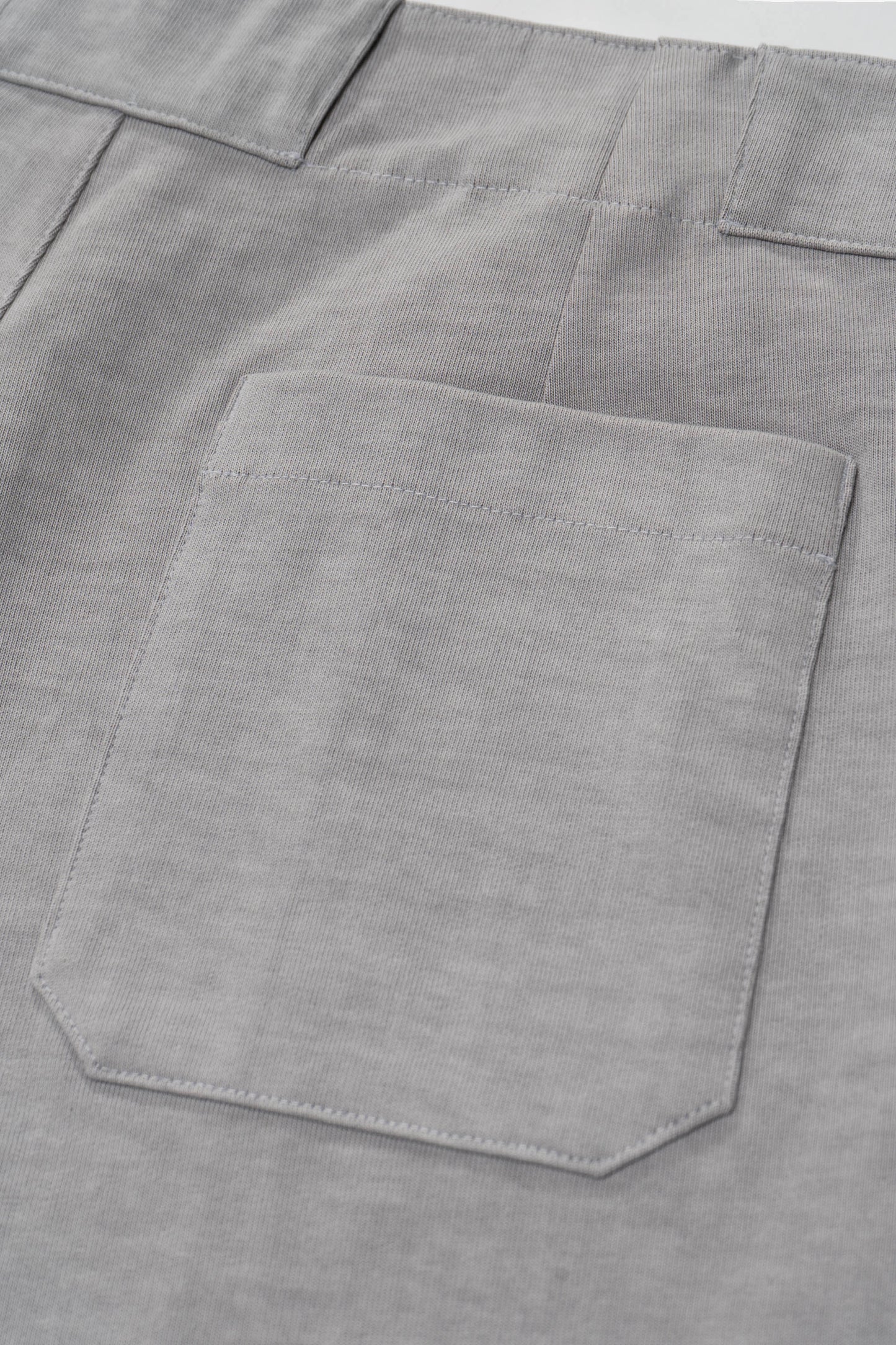 Back pocket detail of LW1100 Jersey Trouser in Pigment Chalk