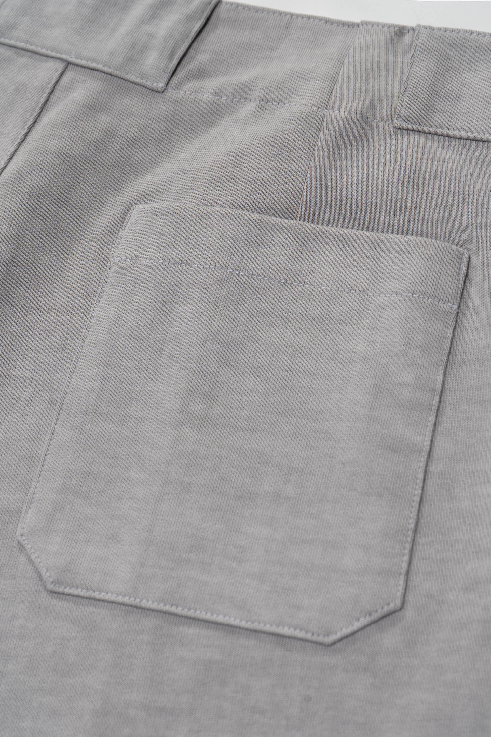 Back pocket detail of LW1100 Jersey Trouser in Pigment Chalk