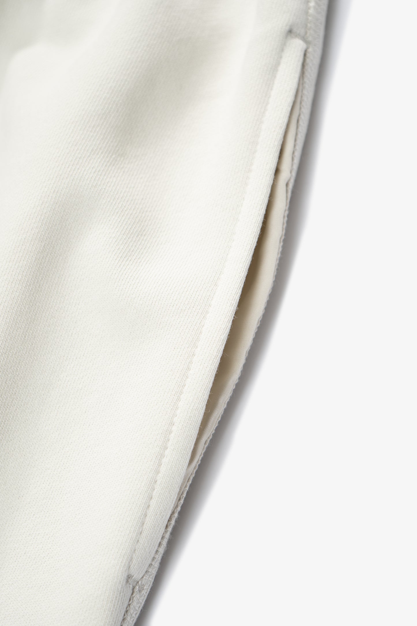Pocket detail of LW1155 Woven WB Sweatpant in Off White