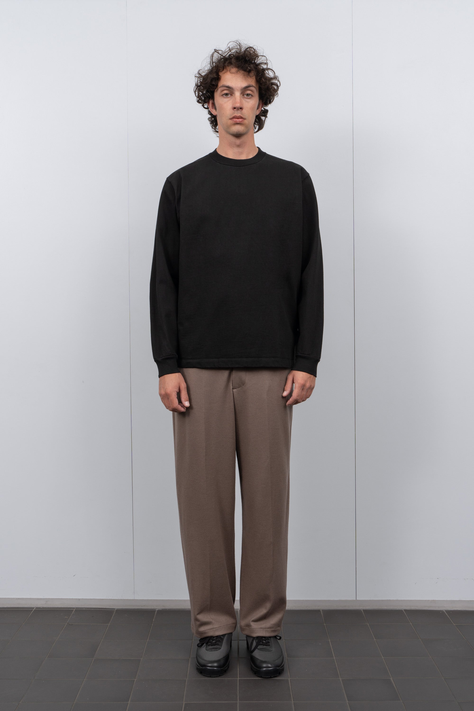 LW130LS Rugby T-shirt in Black on a model