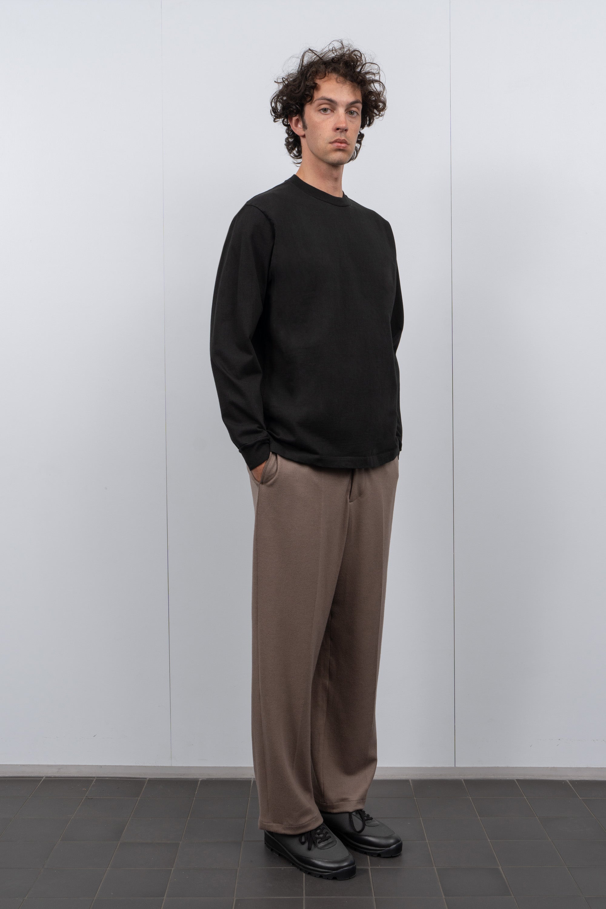 LW130LS Rugby T-shirt in Black on a model