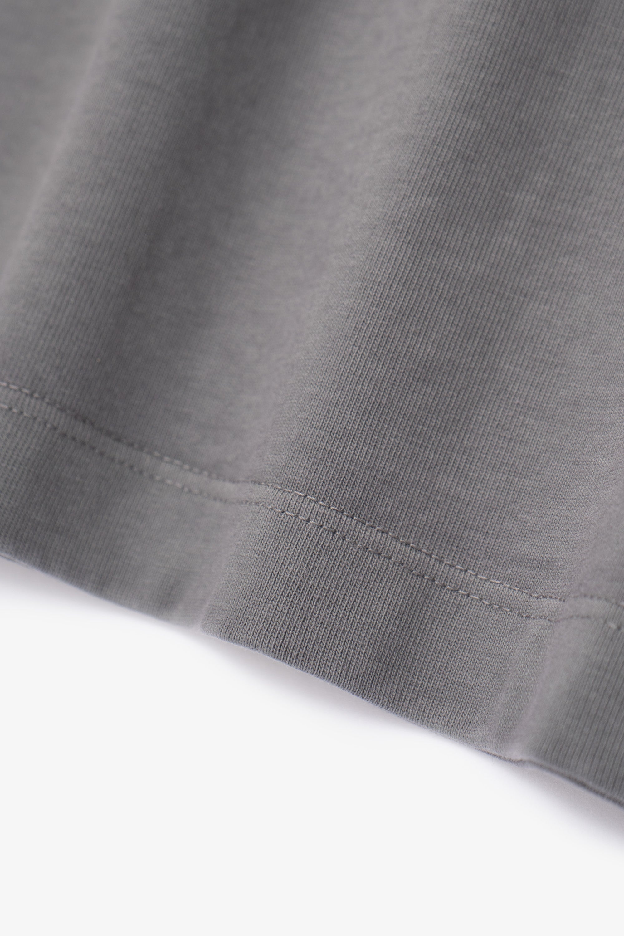 Close-up of fabric ripple of LW130T Rugby T-shirt in kelp