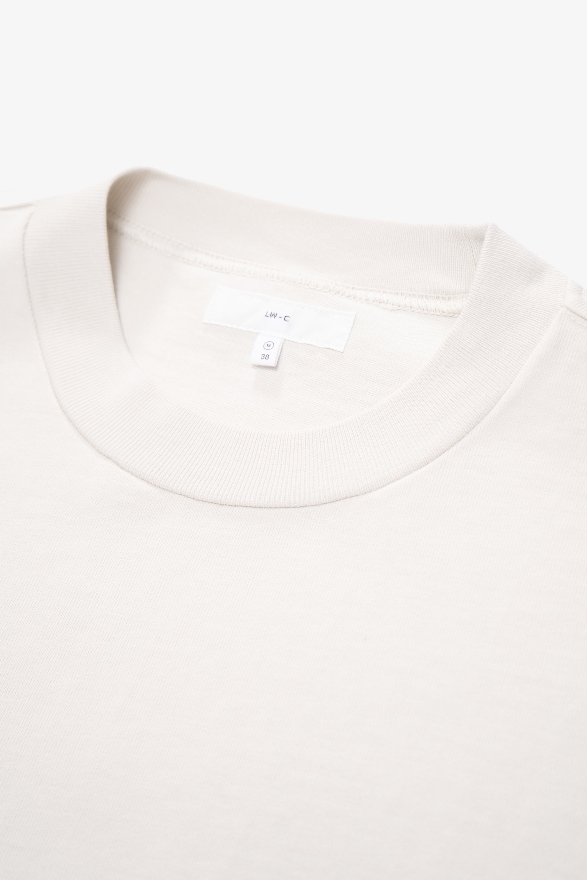Close-up of collar of LW130T Rugby T-shirt in off white