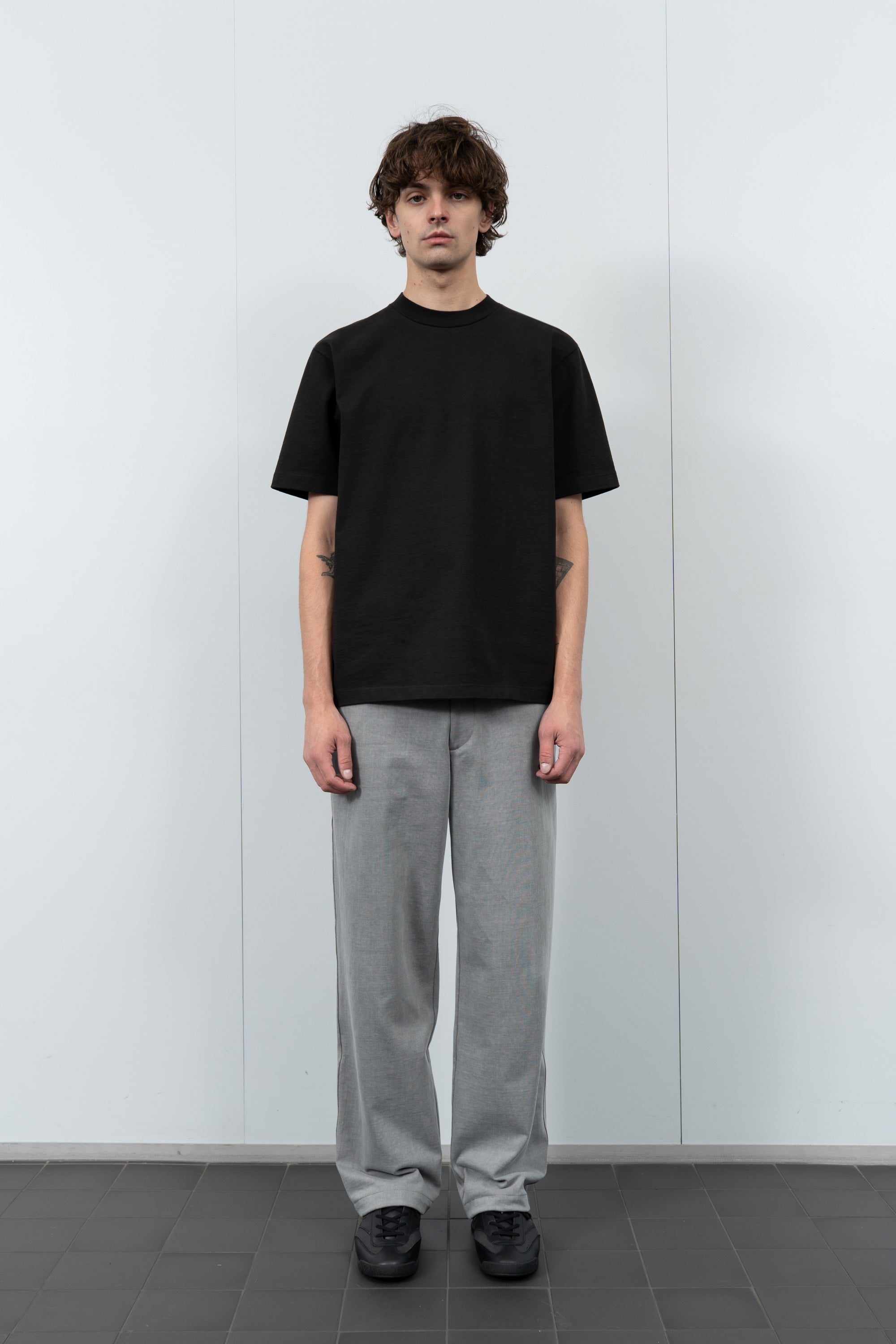 Model poses in LW130T Rugby T-shirt in Shadow