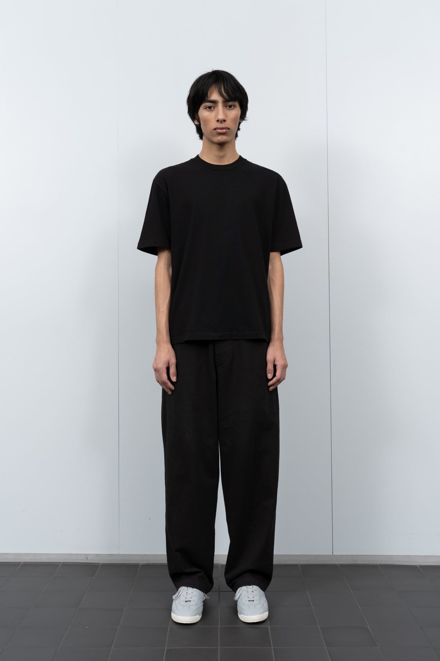 LW141 Athens T-shirt in Black on a model