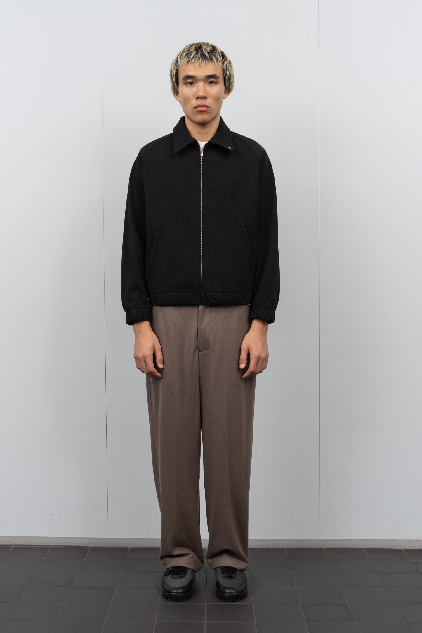 LW1670 Coach Jacket in Black on a model