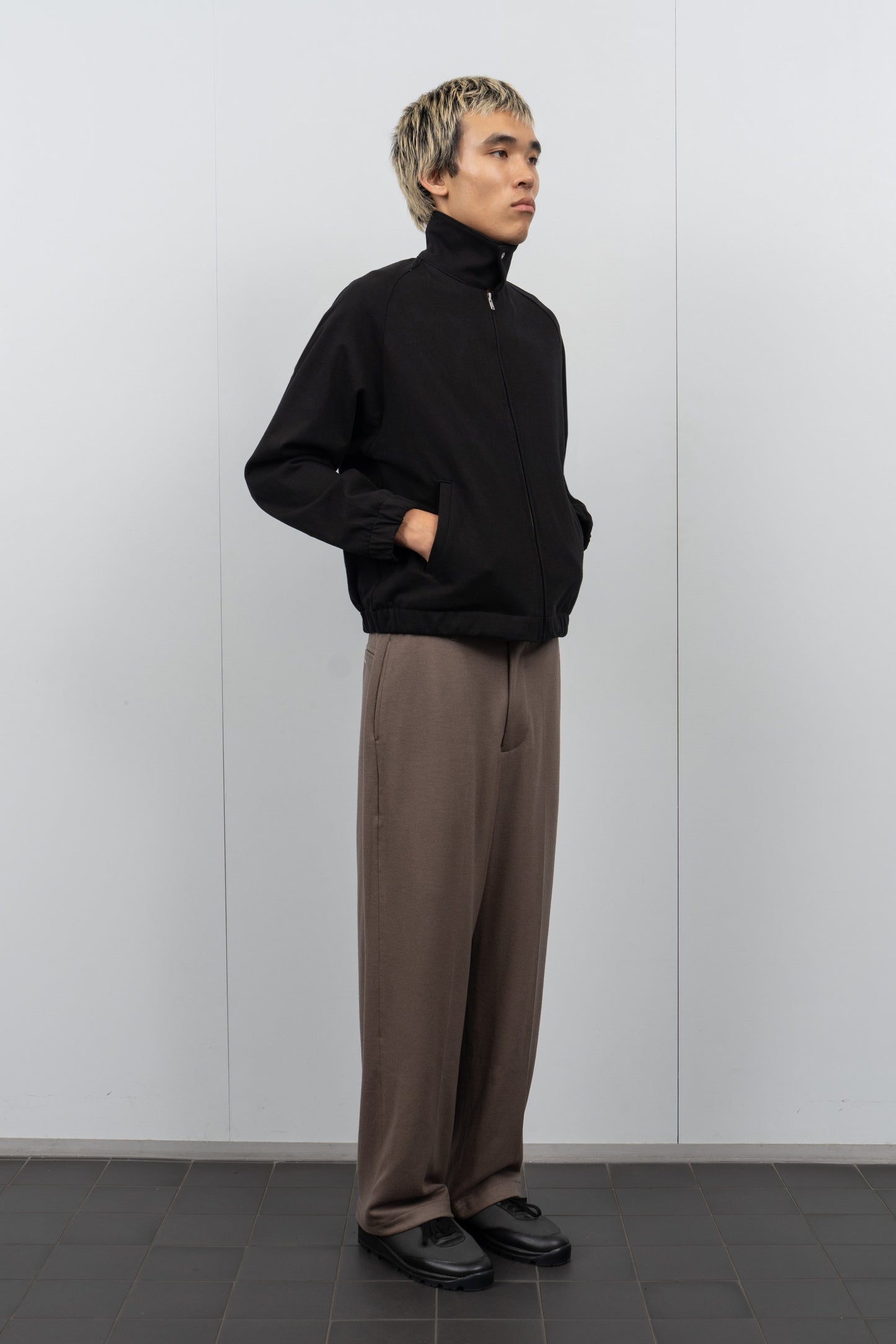 LW1670 Coach Jacket in Black on a model