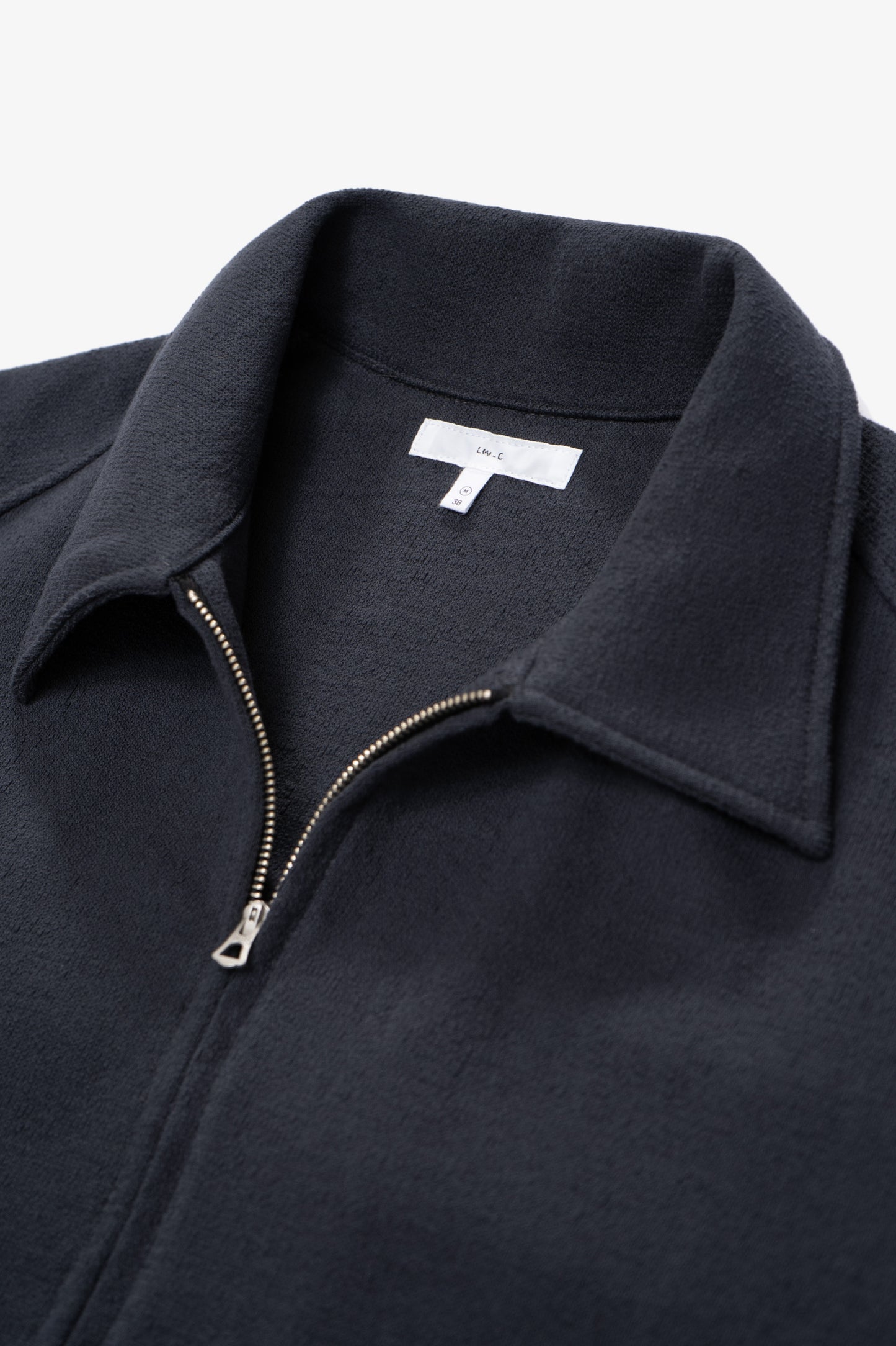 Front zipper detail of LW1680TEX Textured Coach Jacket