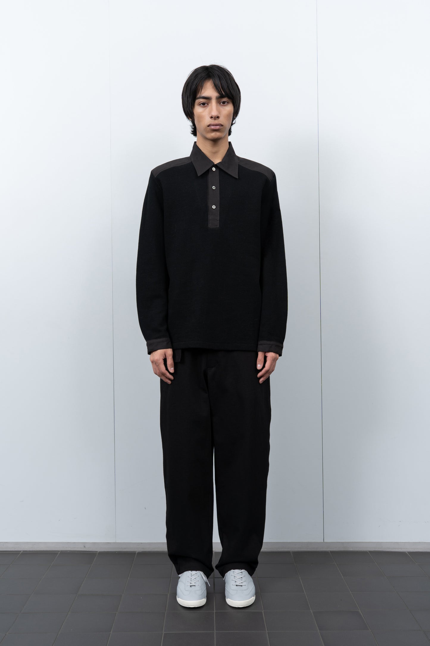 LW415CL Double Knit Polo in Black on a model
