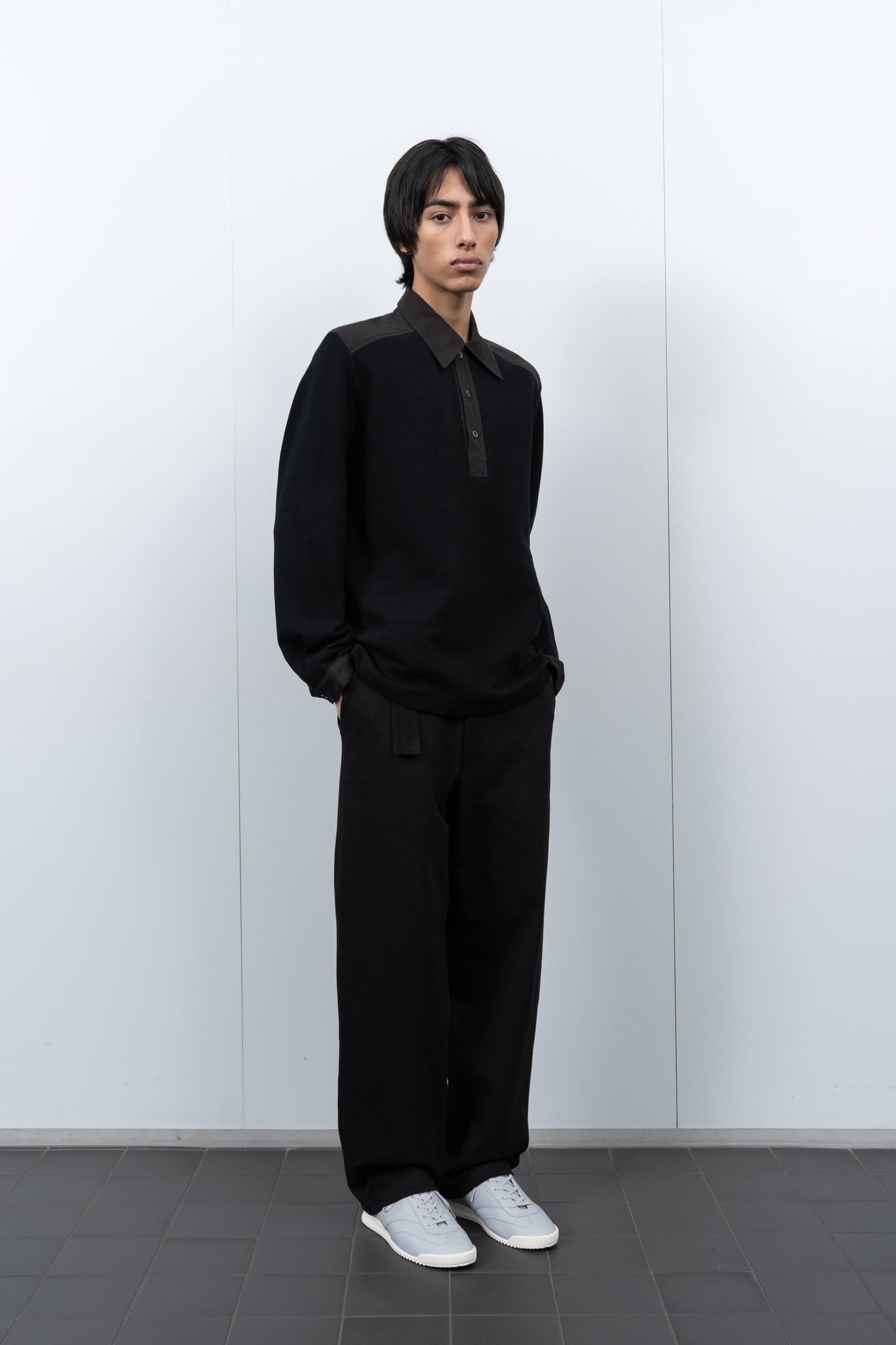 LW415CL Double Knit Polo in Black on a model