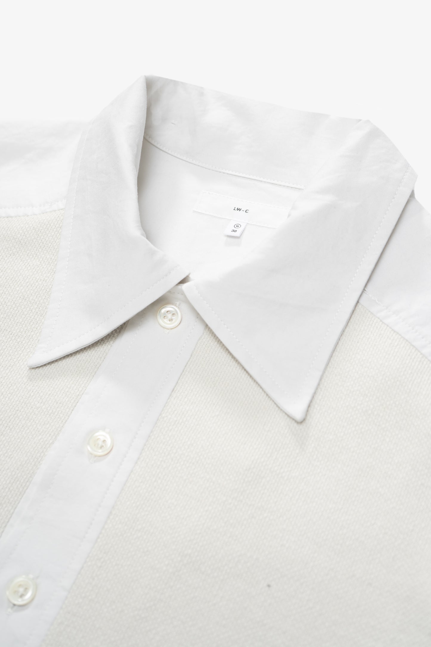 Collar detail of LW415CL Double Knit Polo in Off White