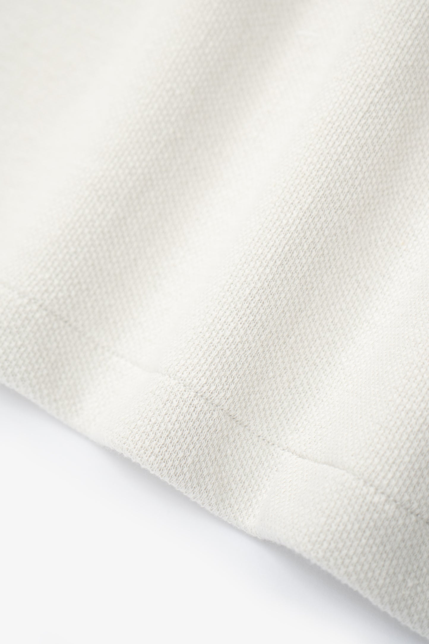 Fabric ripple detail of LW415CL Double Knit Polo in Off White