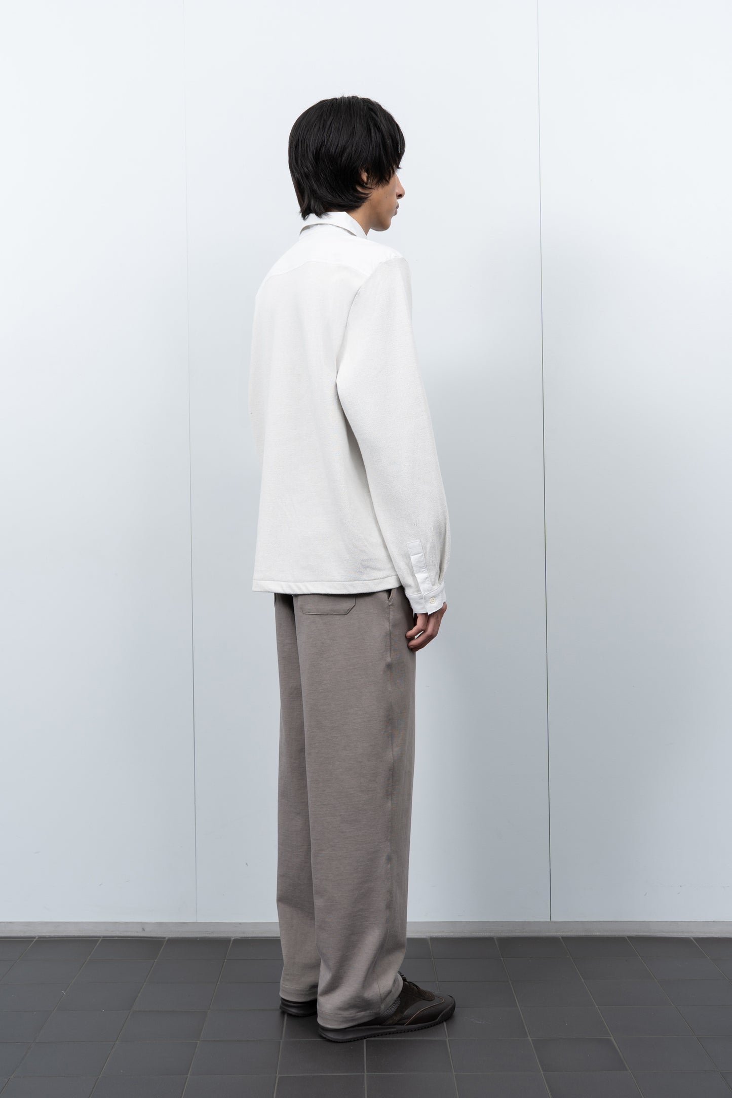 LW415CL Double Knit Polo in Off White on a model