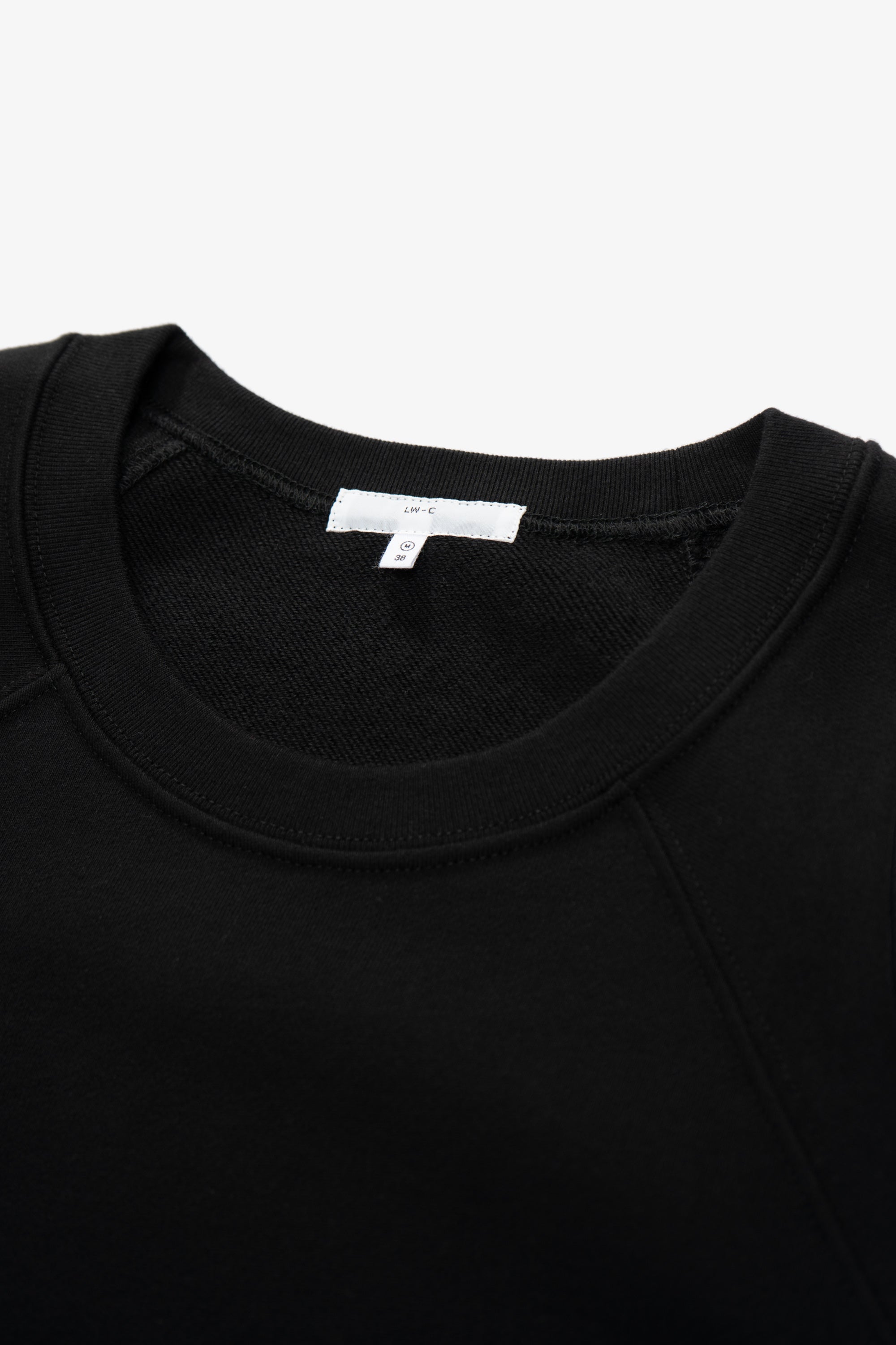 Collar detail of LW602 Cuff Off Raglan Sweatshirt in Black