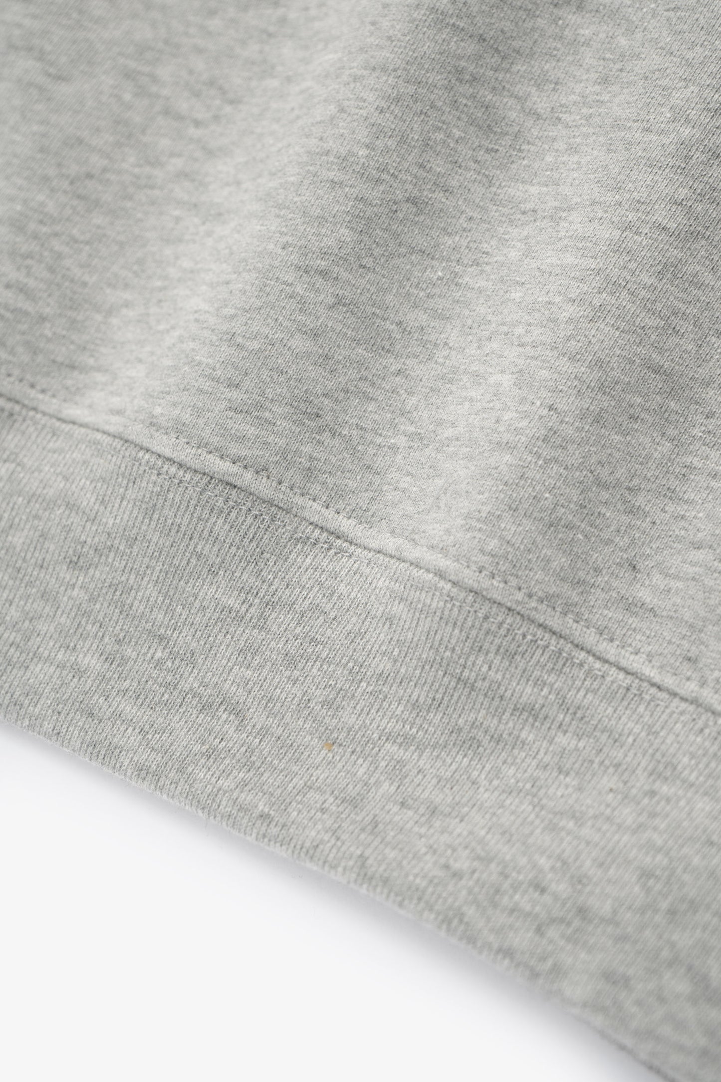 Hem detail of LW602 Cuff Off Raglan Sweatshirt in Heather Grey