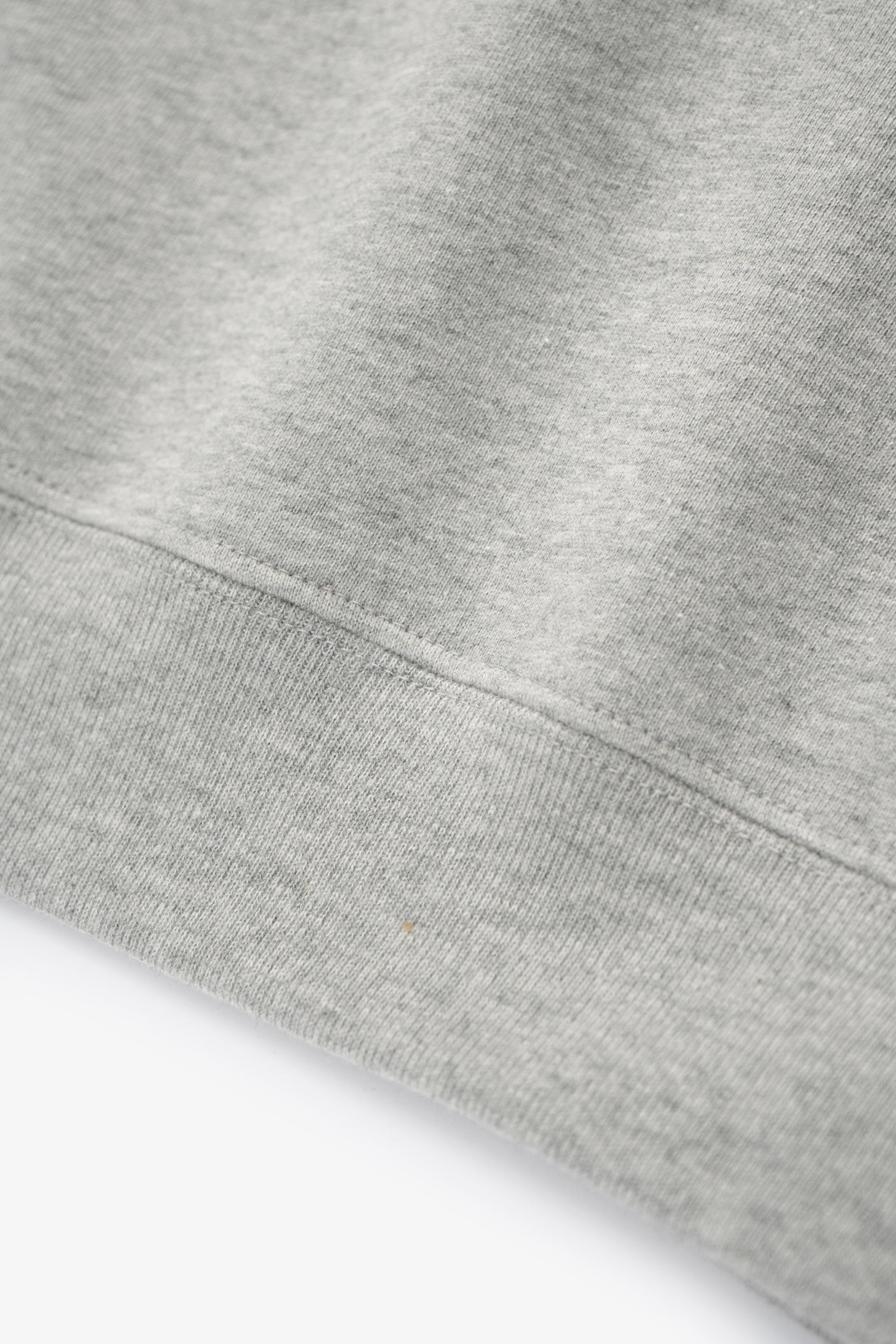 Hem detail of LW602 Cuff Off Raglan Sweatshirt in Heather Grey