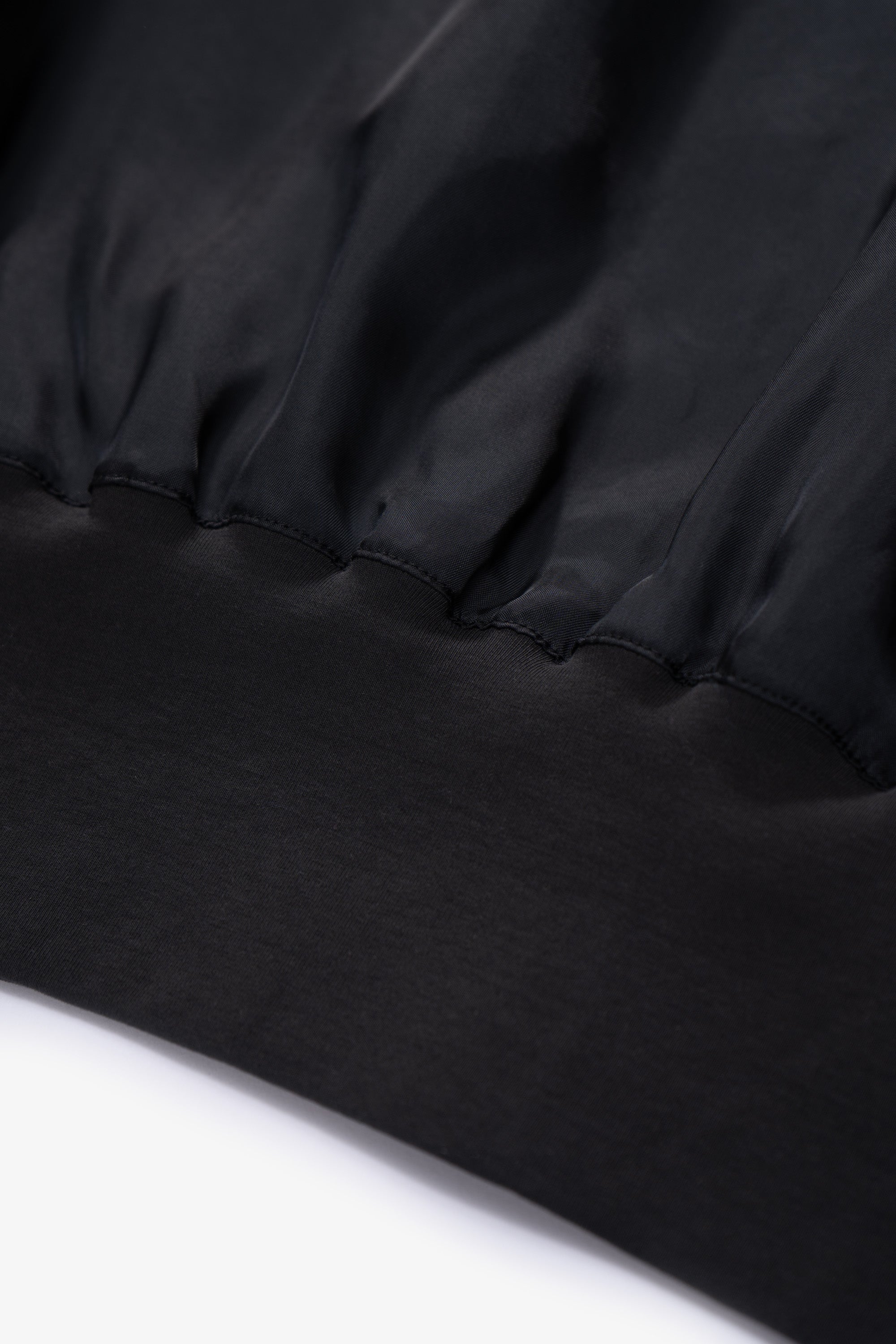 Cuff detail of LW605 Cupro Pullover in Black