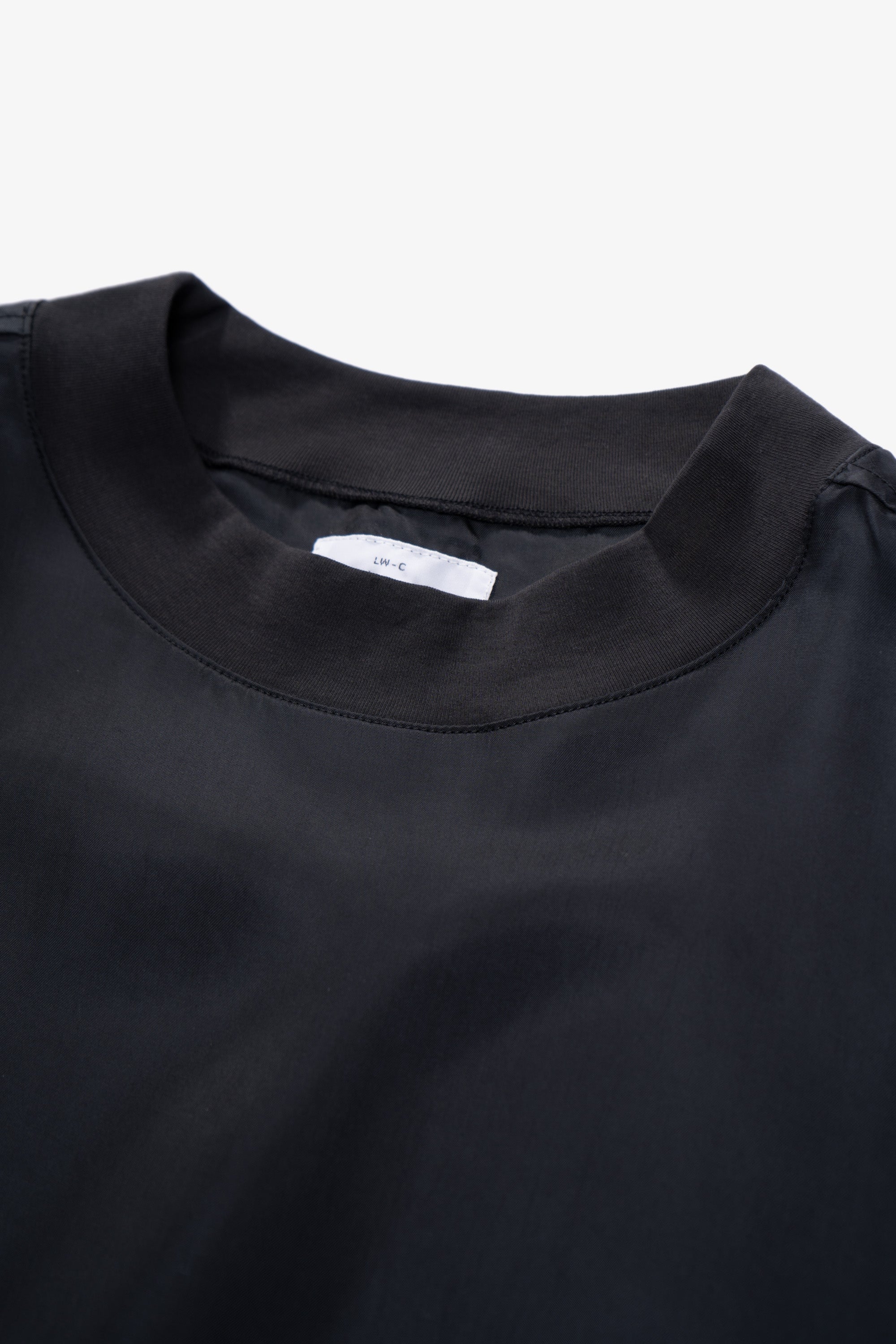 Collar detail of LW605 Cupro Pullover in Black