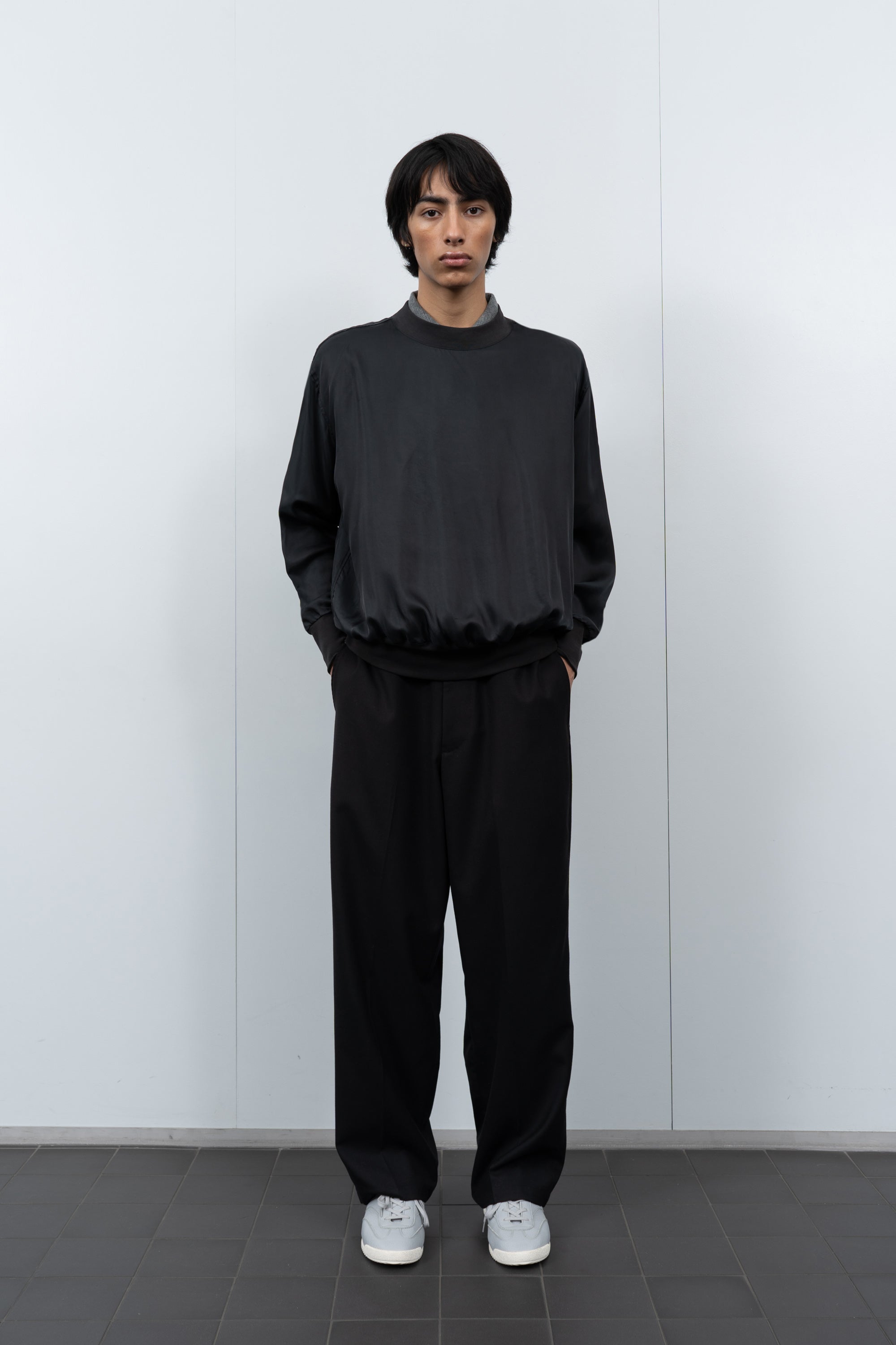 LW605 Cupro Pullover in Black on a model