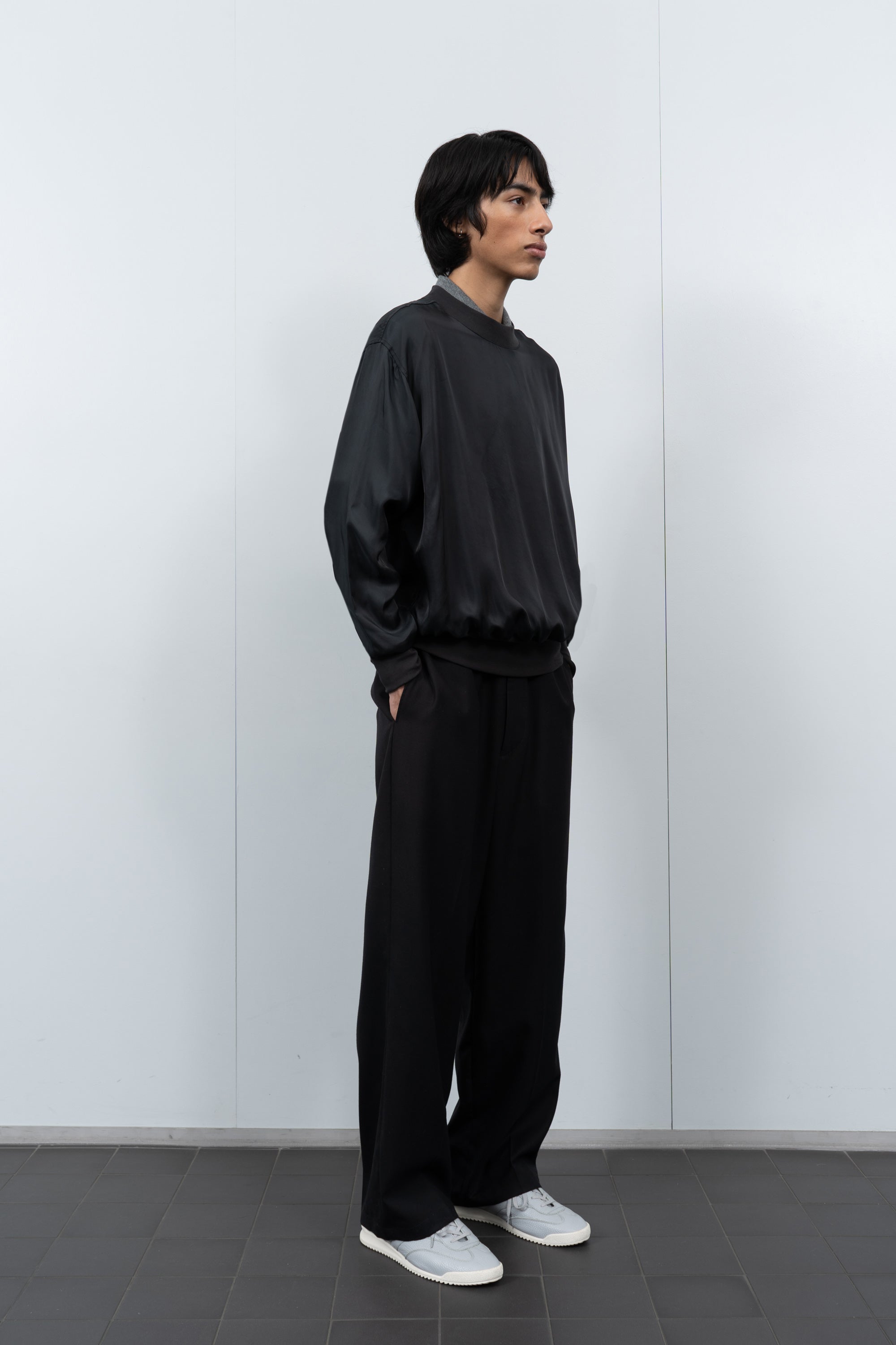LW605 Cupro Pullover in Black on a model