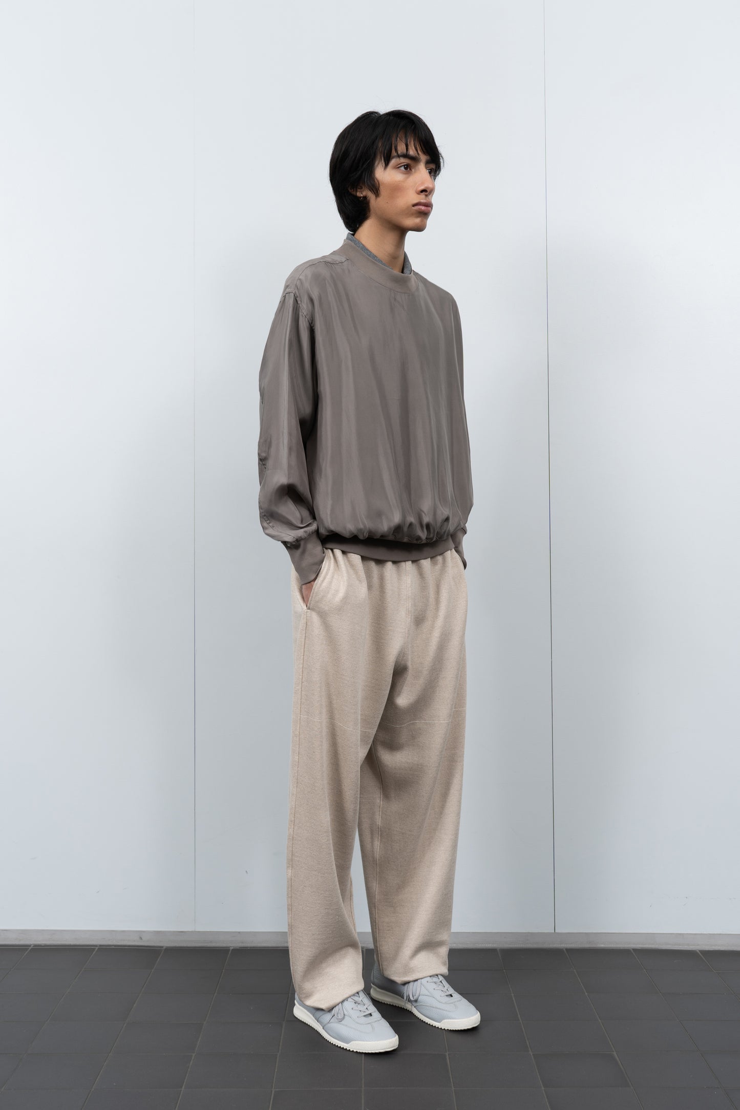 LW605 Cupro Pullover in Deep Grey on a model