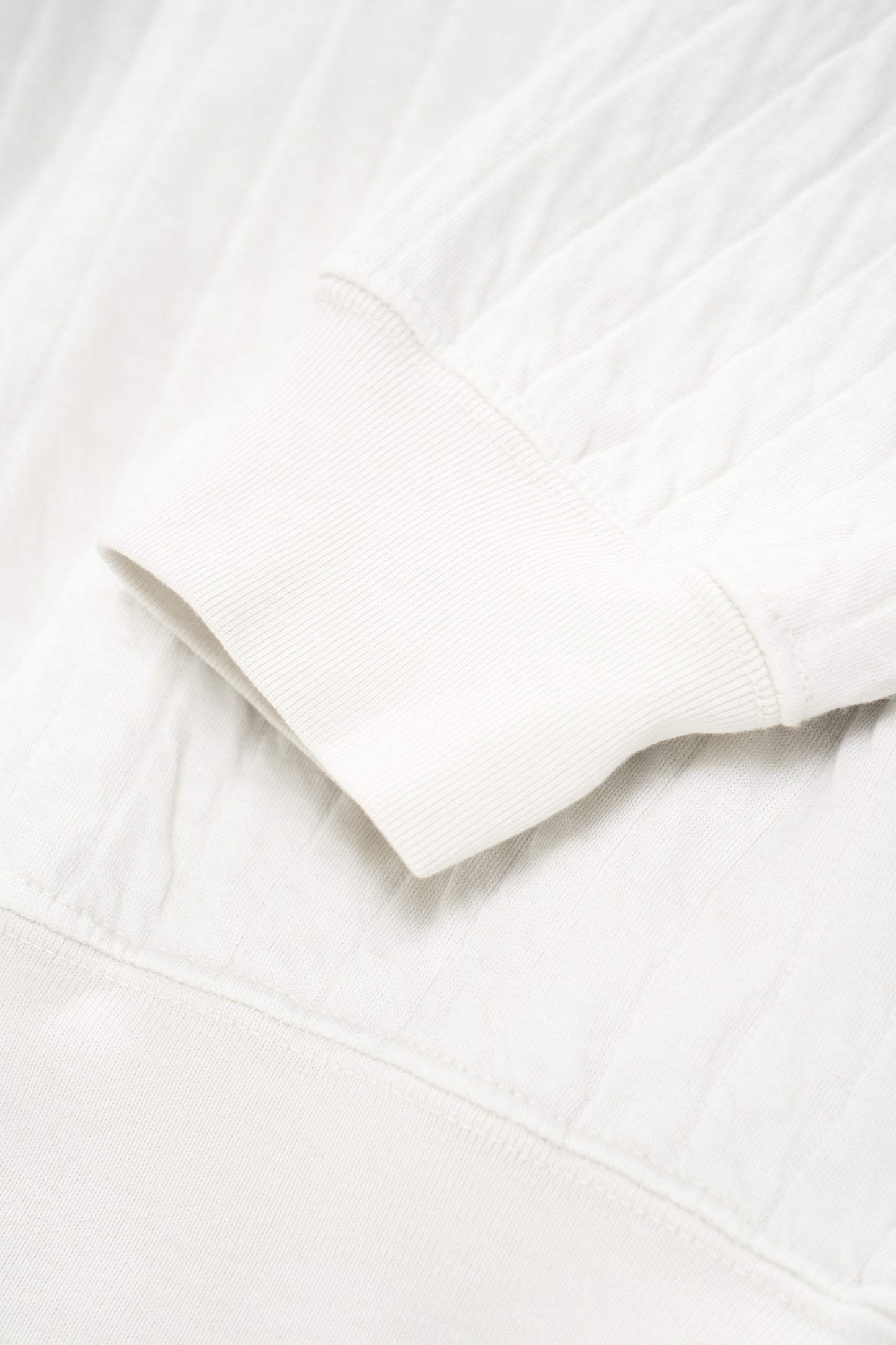 Cuff detail of LW610Q Quilted Crewneck in Off White