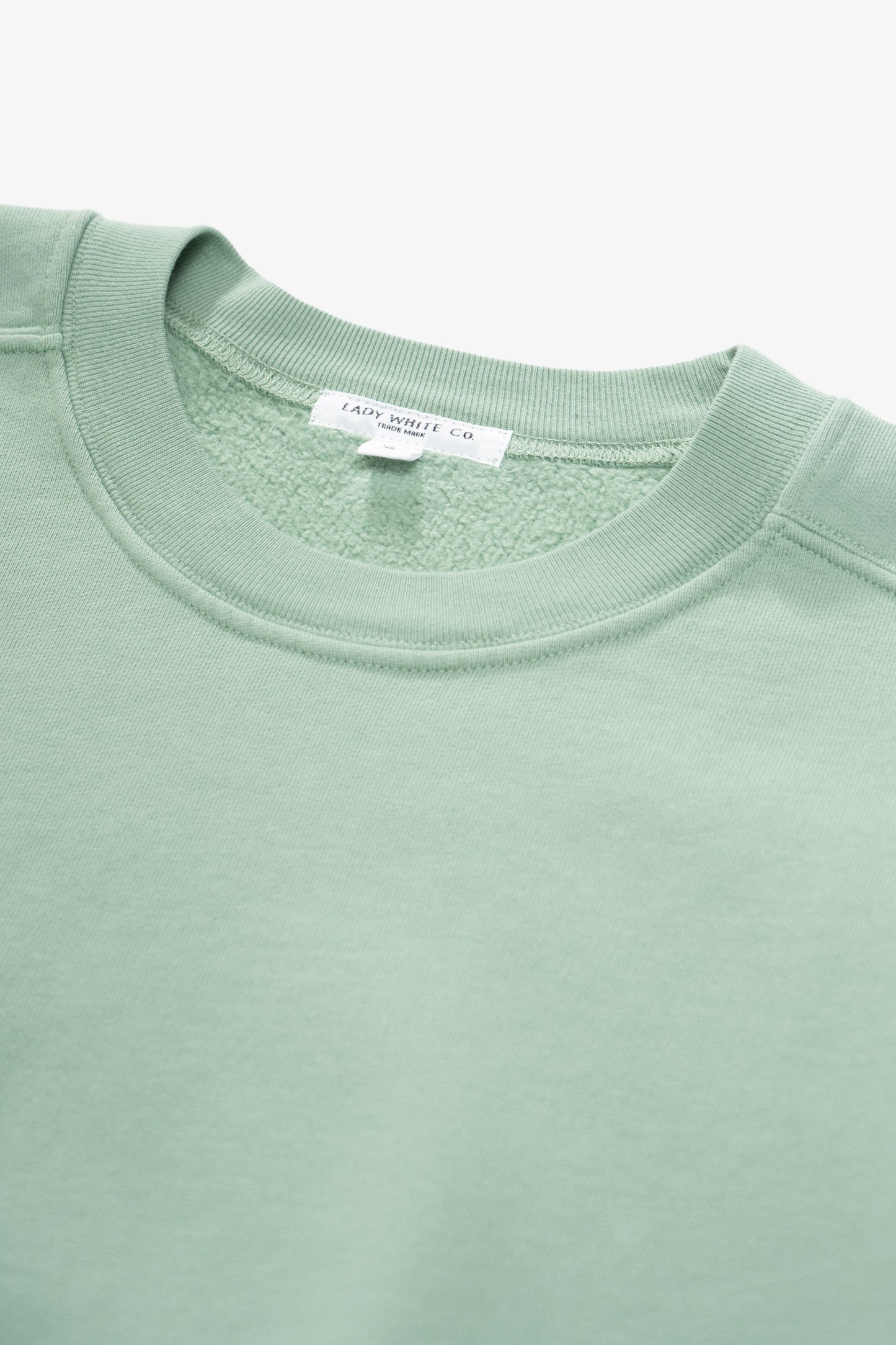 Collar detail of LW624 Mini Crewneck in Inverness Green
