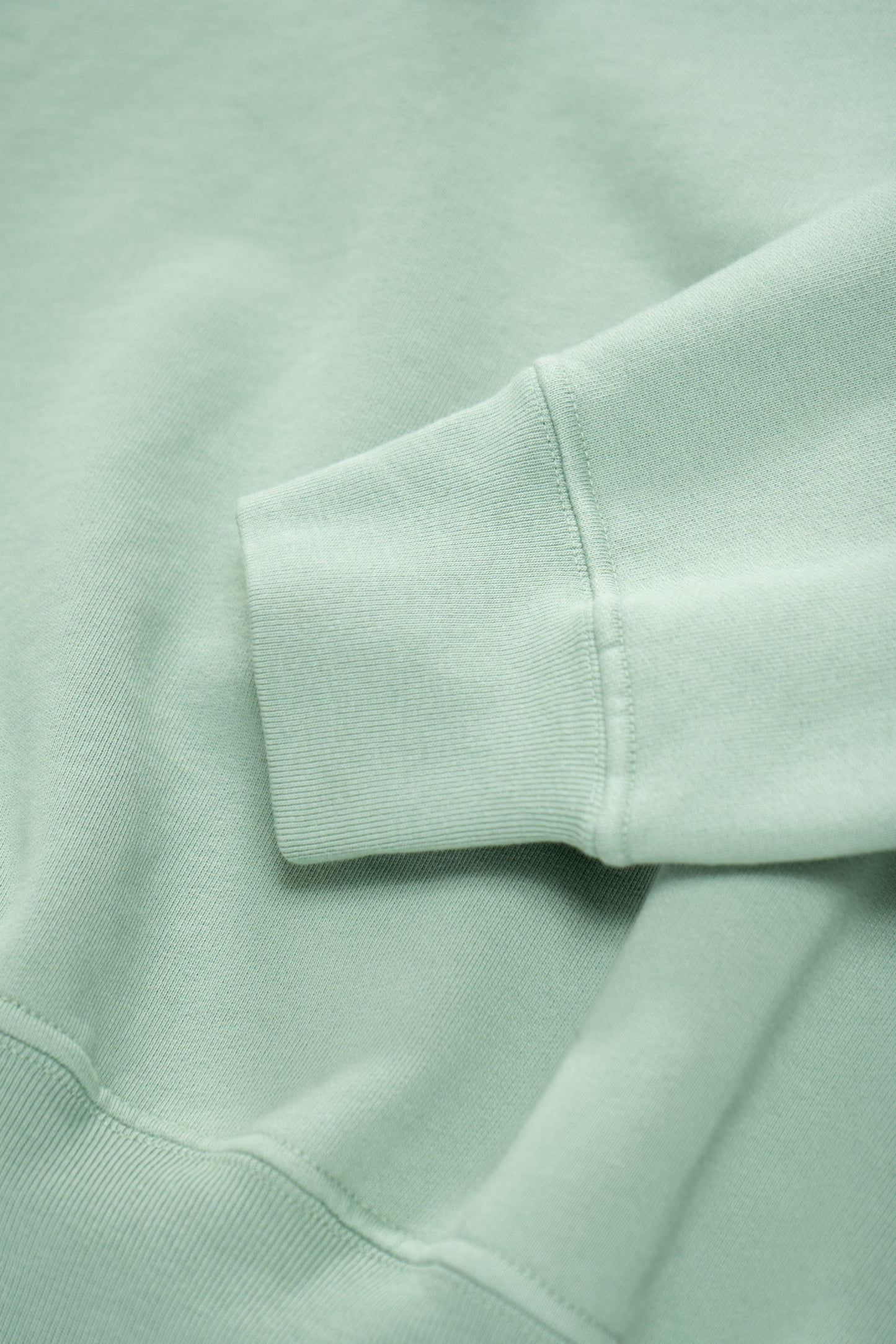 Cuff detail of LW624 Mini Crewneck in Inverness Green