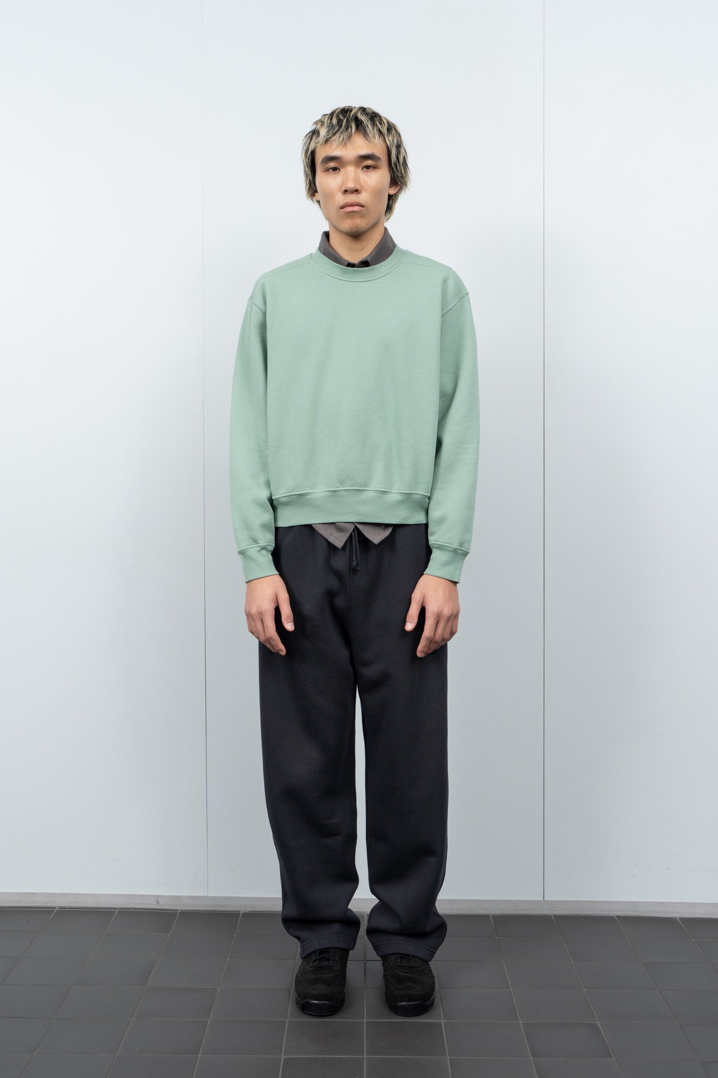 LW612 Mini Crewneck in Inverness Green on a model