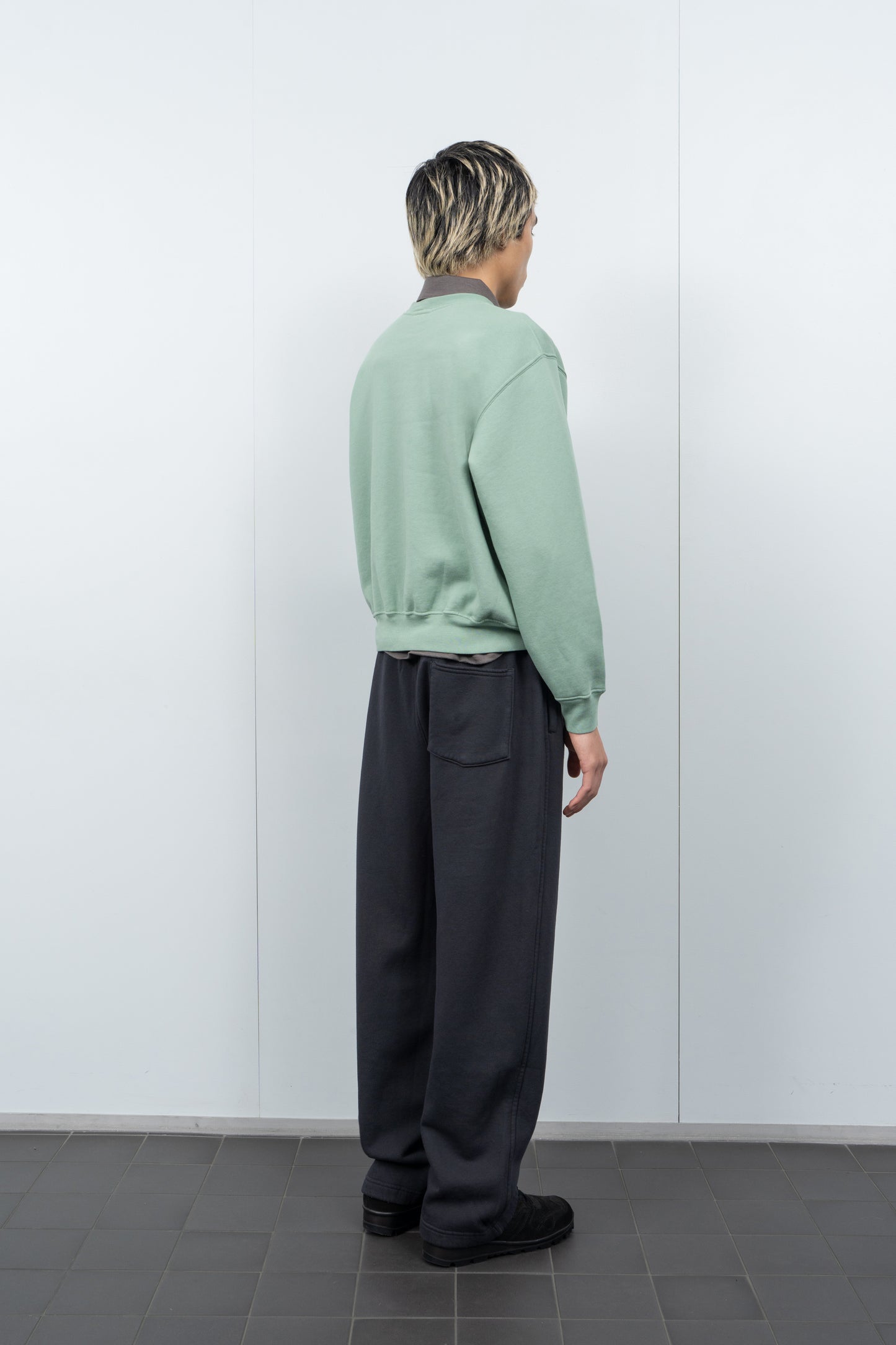 LW612 Mini Crewneck in Inverness Green on a model