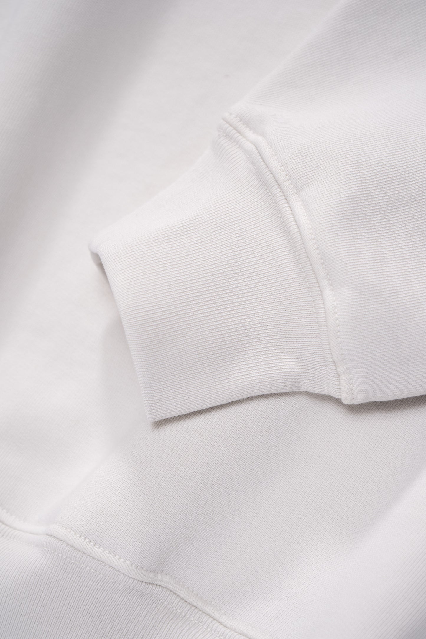 Cuff detail of LW612 Mini Crewneck in Off White