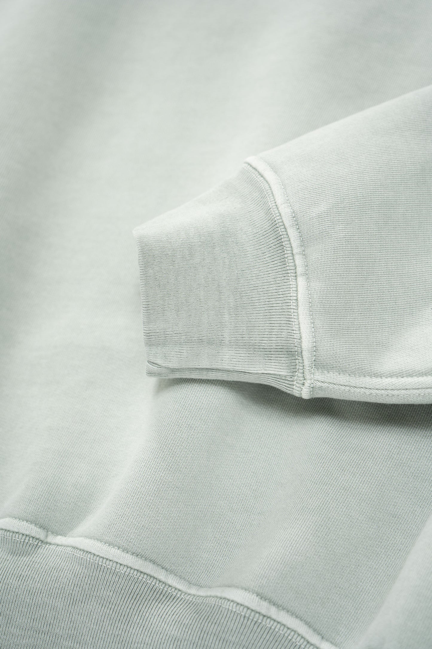 Cuff detail of LW612 Mini Crewneck in Pigment Mineral