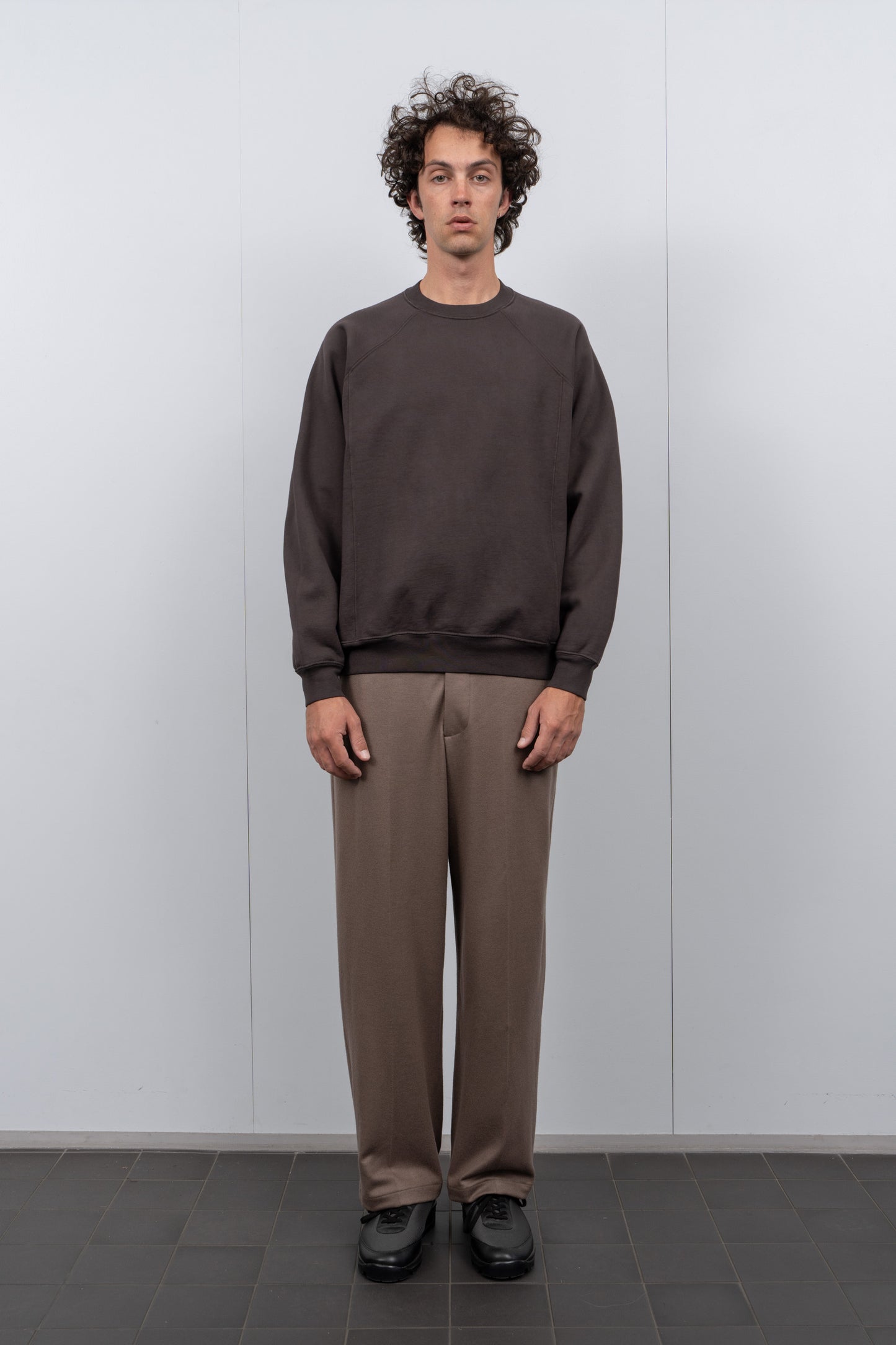 LW620 Heavy Gusset Crewneck in Tire Black on a model