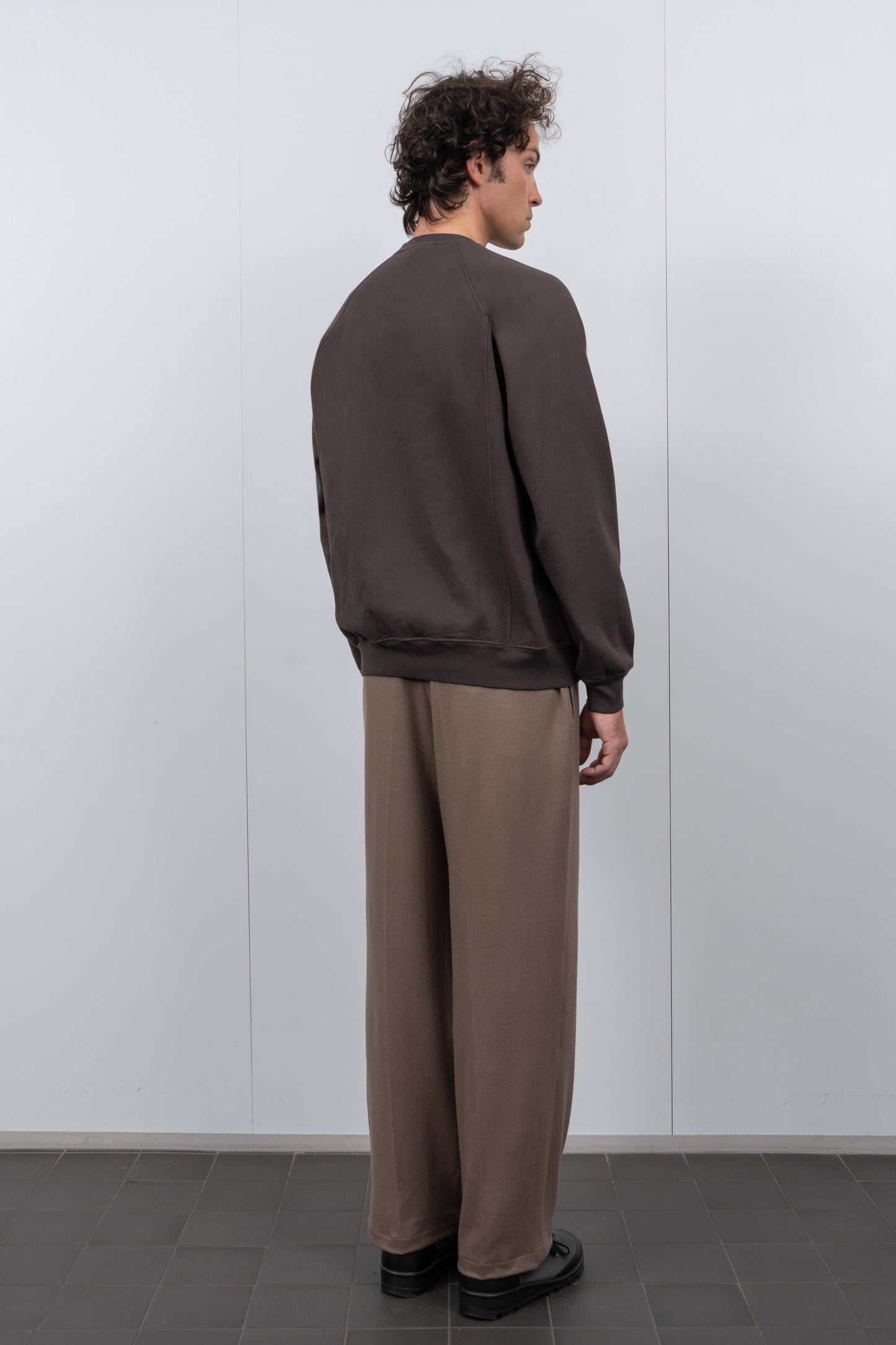 LW620 Heavy Gusset Crewneck in Tire Black on a model
