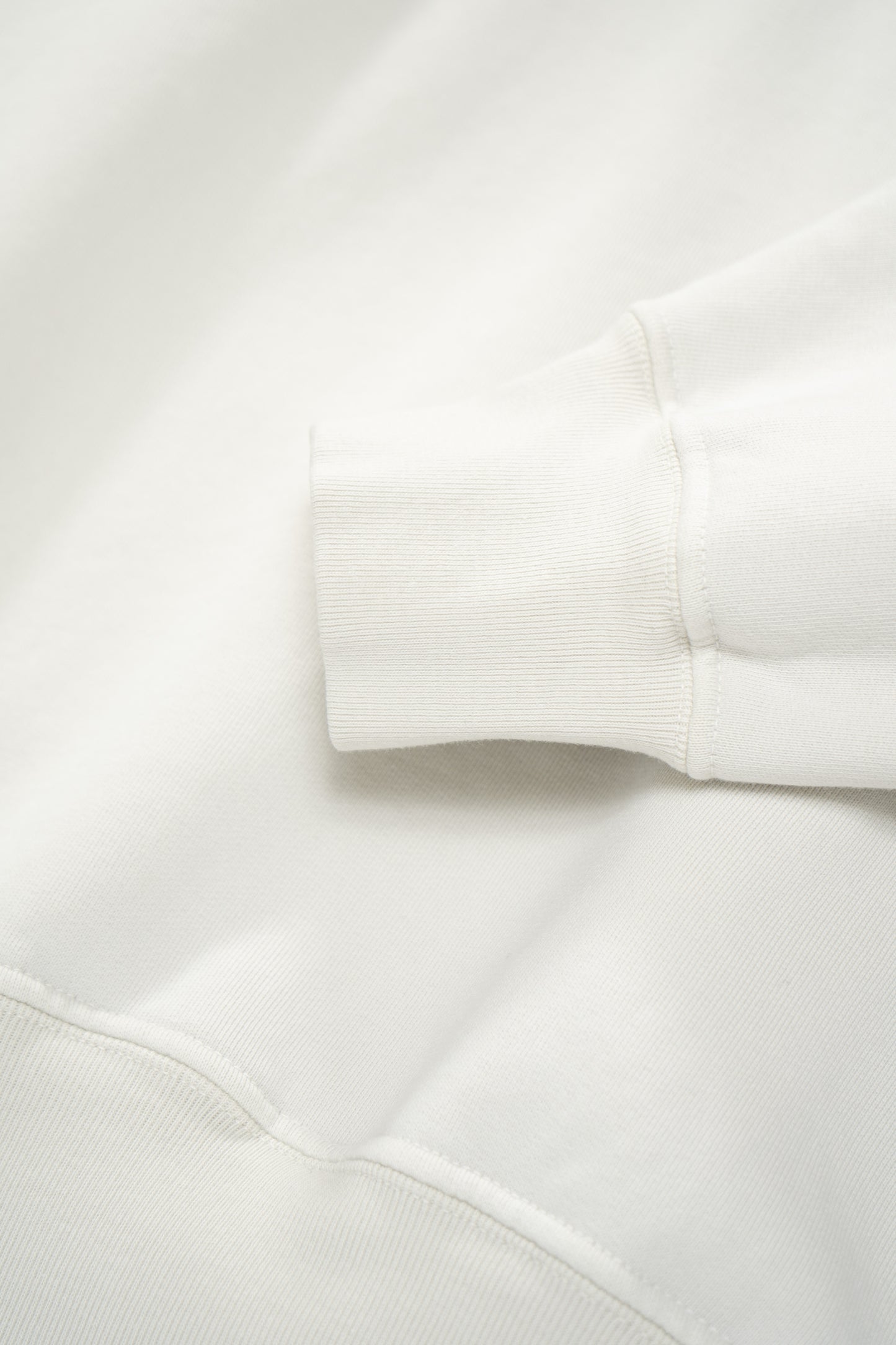 Cuff detail of LW624 Mini Hoodie in Off White