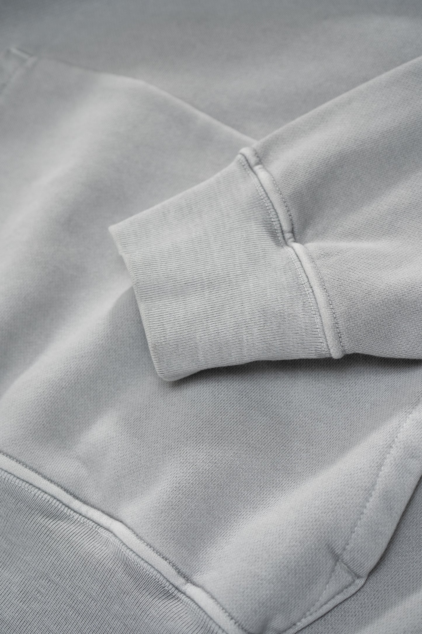 Cuff detail of LW624 Mini Hoodie in Pigment Chalk