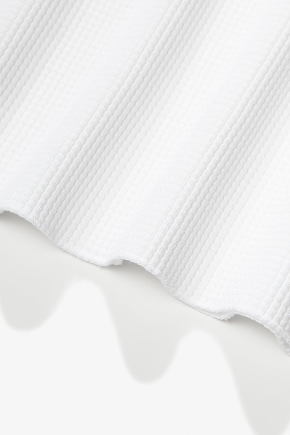 Fabric ripple detail of LW217 Raglan Thermal in White