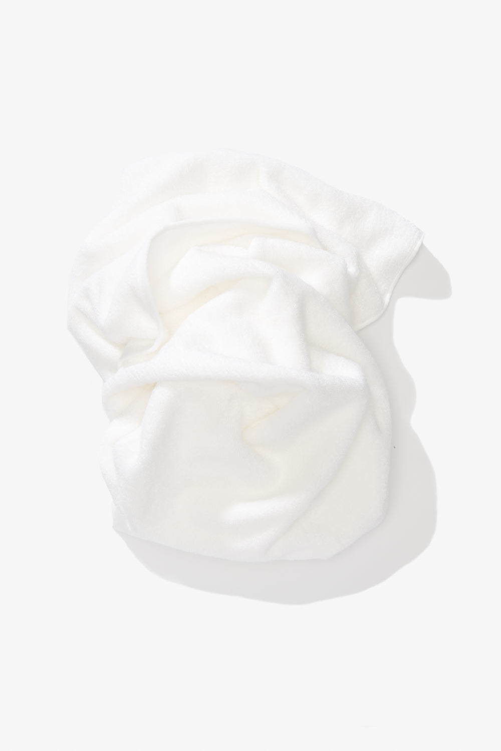 A rouched towel in white