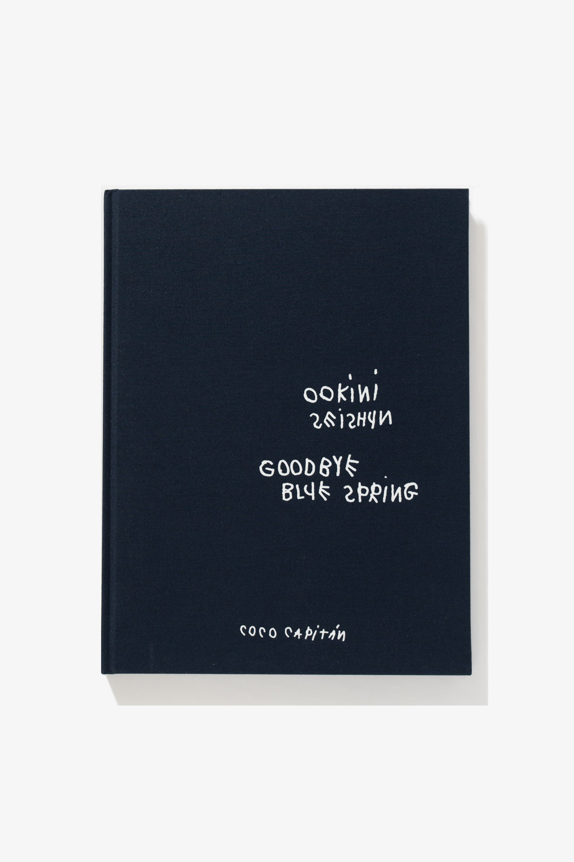 Full-length image of the cover of Coco Capitan’s photography book, Goodbye Blue Spring. 
