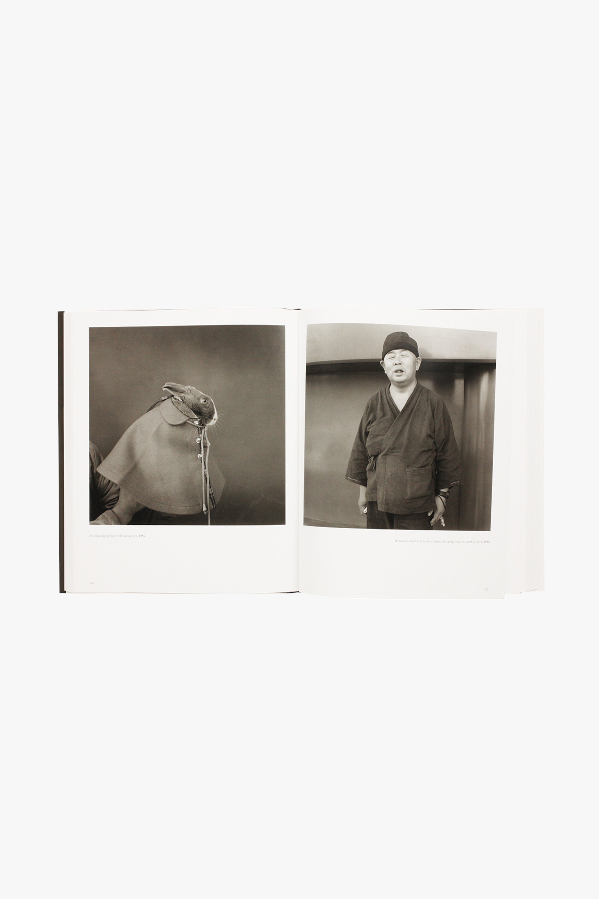 Spread from Hiroh Kikai's "Asakusa Portraits." Verso shows a rabbit dressed in a cape. Recto shows a man posing against a plain background, a cigarette in his left hand.