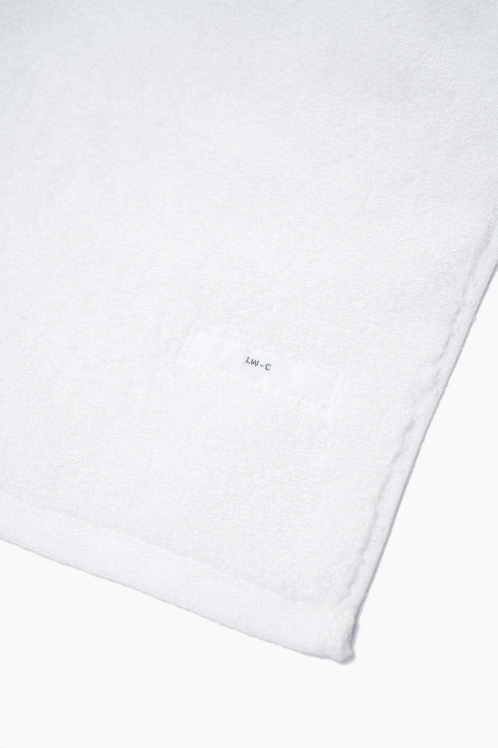 Corners of bath towels, showing label
